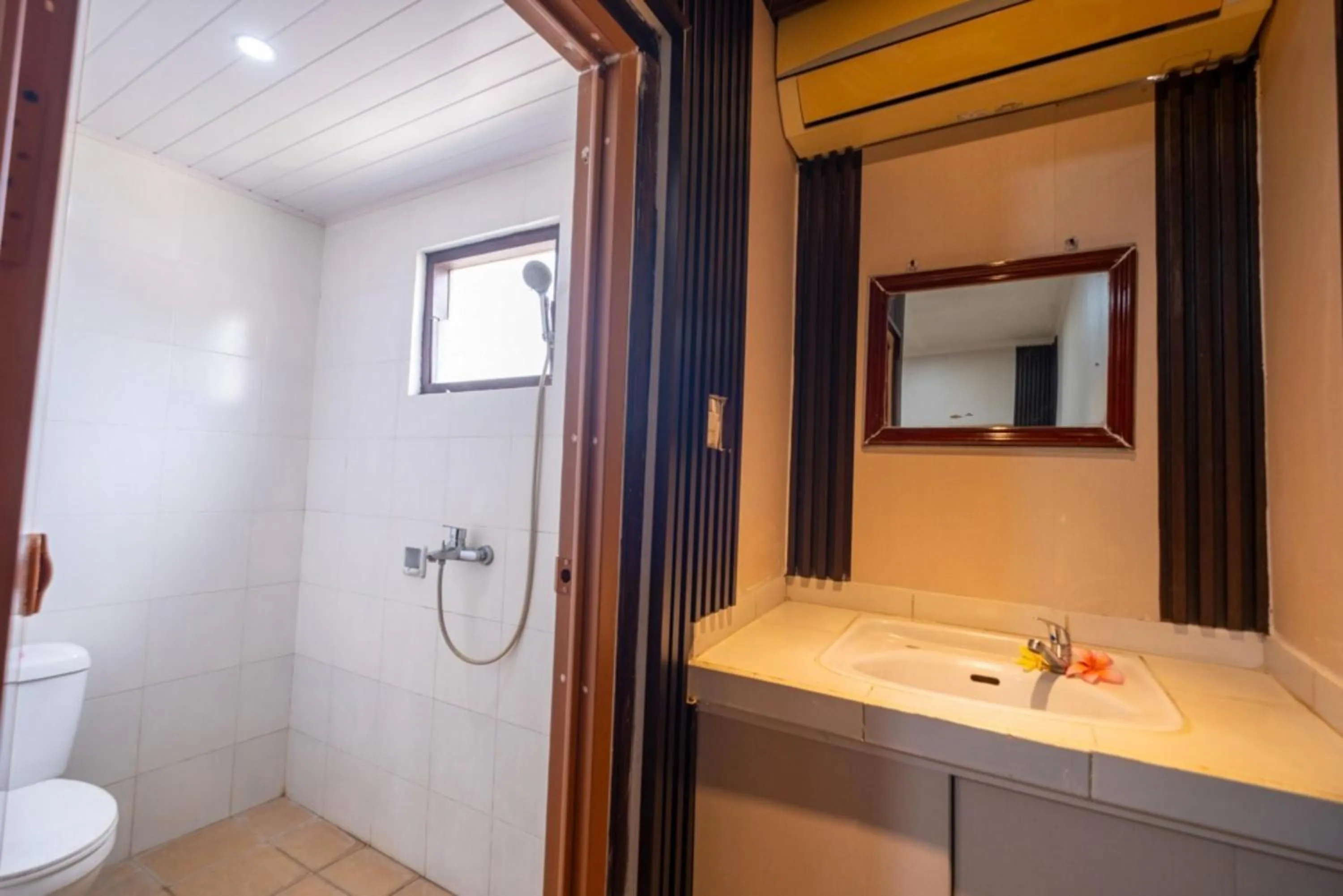 Bathroom in Teba House Ubud by ecommerceloka - CHSE Certified