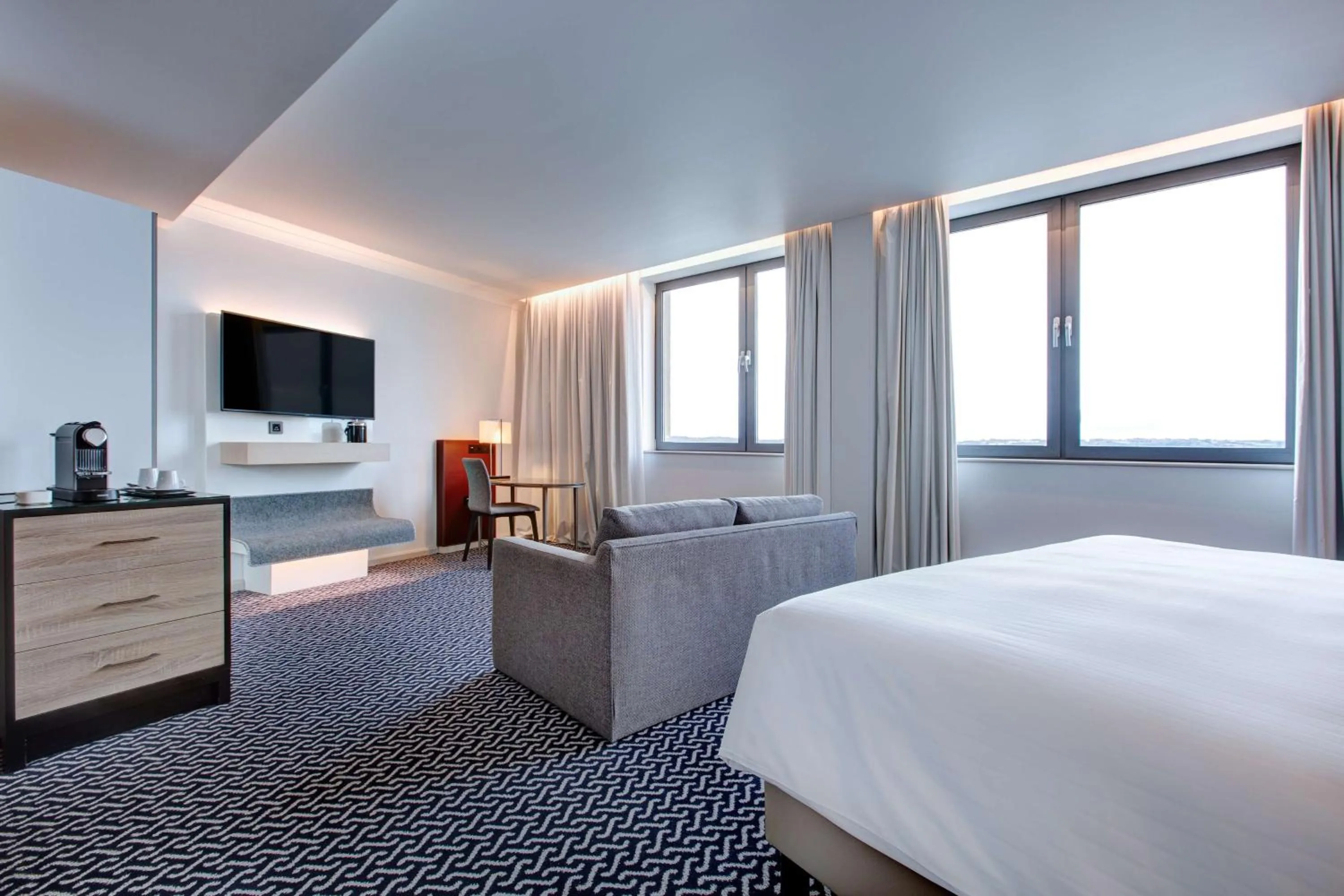 Photo of the whole room, Bed in Radisson Blu Waterfront Hotel, Jersey