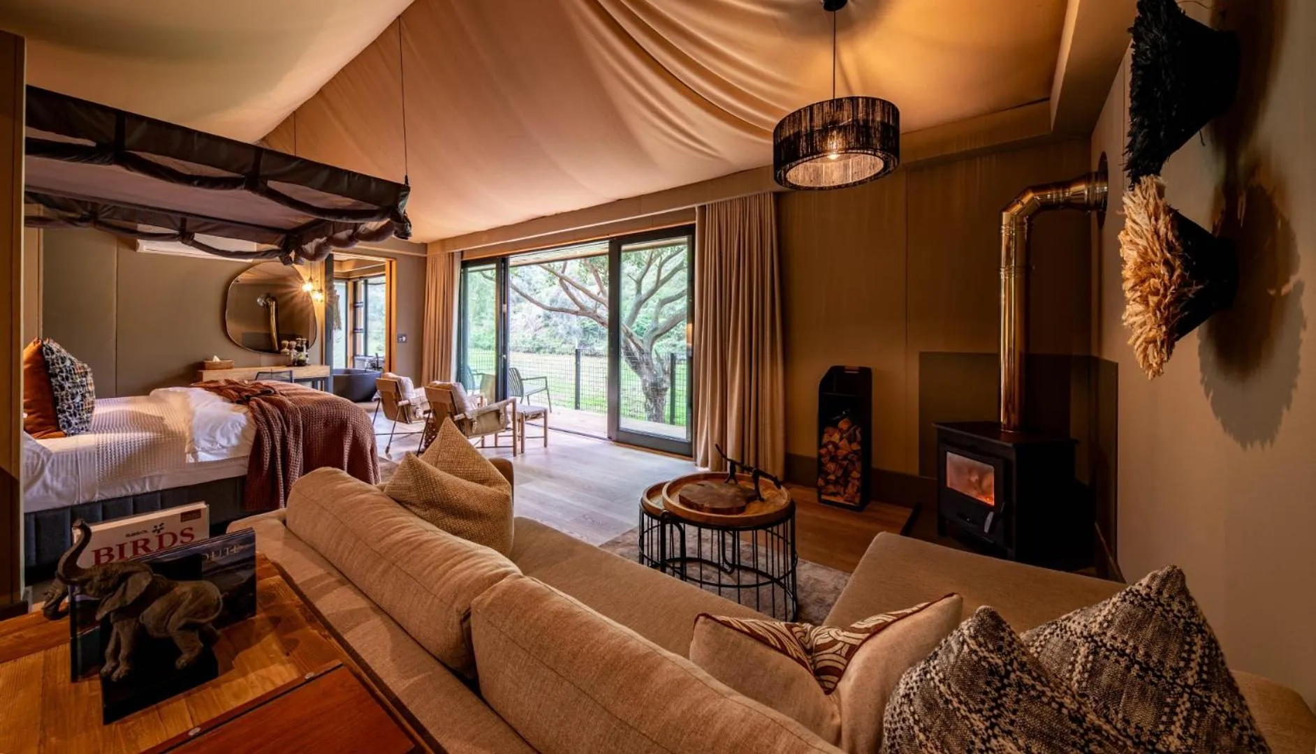 Bed in Botlierskop Tented Lodge