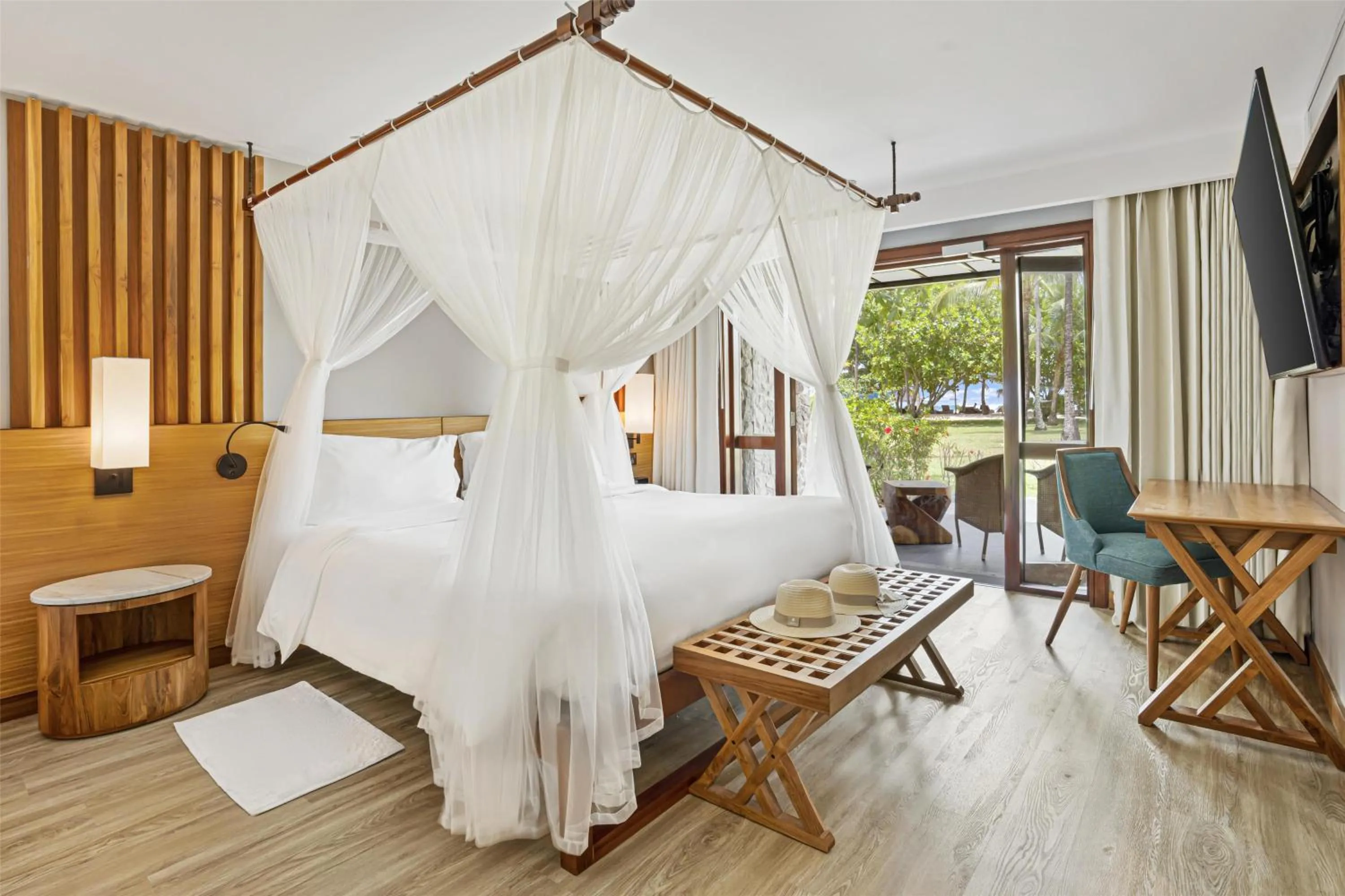 Property building, Bed in Kempinski Seychelles Resort
