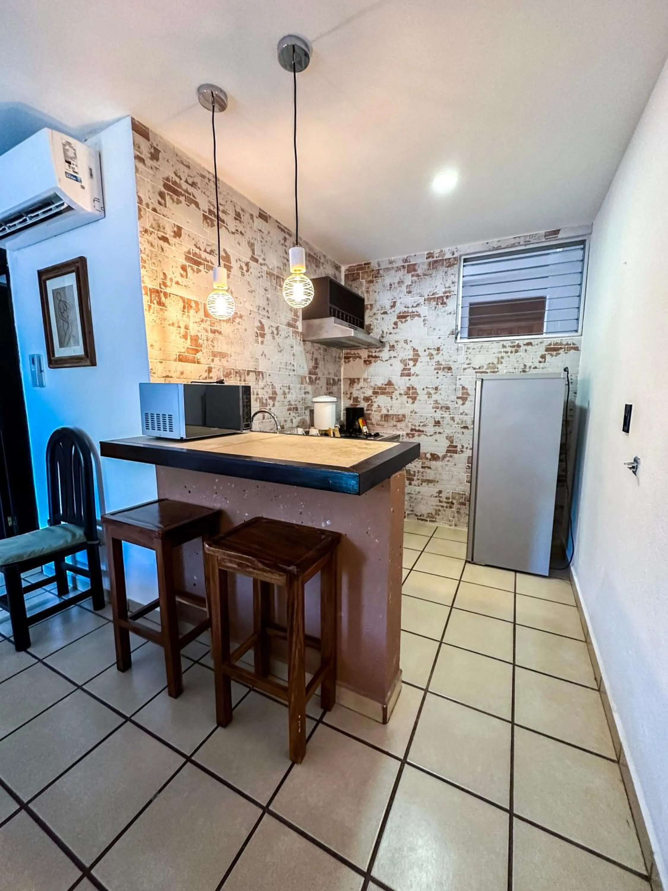 Kitchen or kitchenette in Best Western Posada Chahue