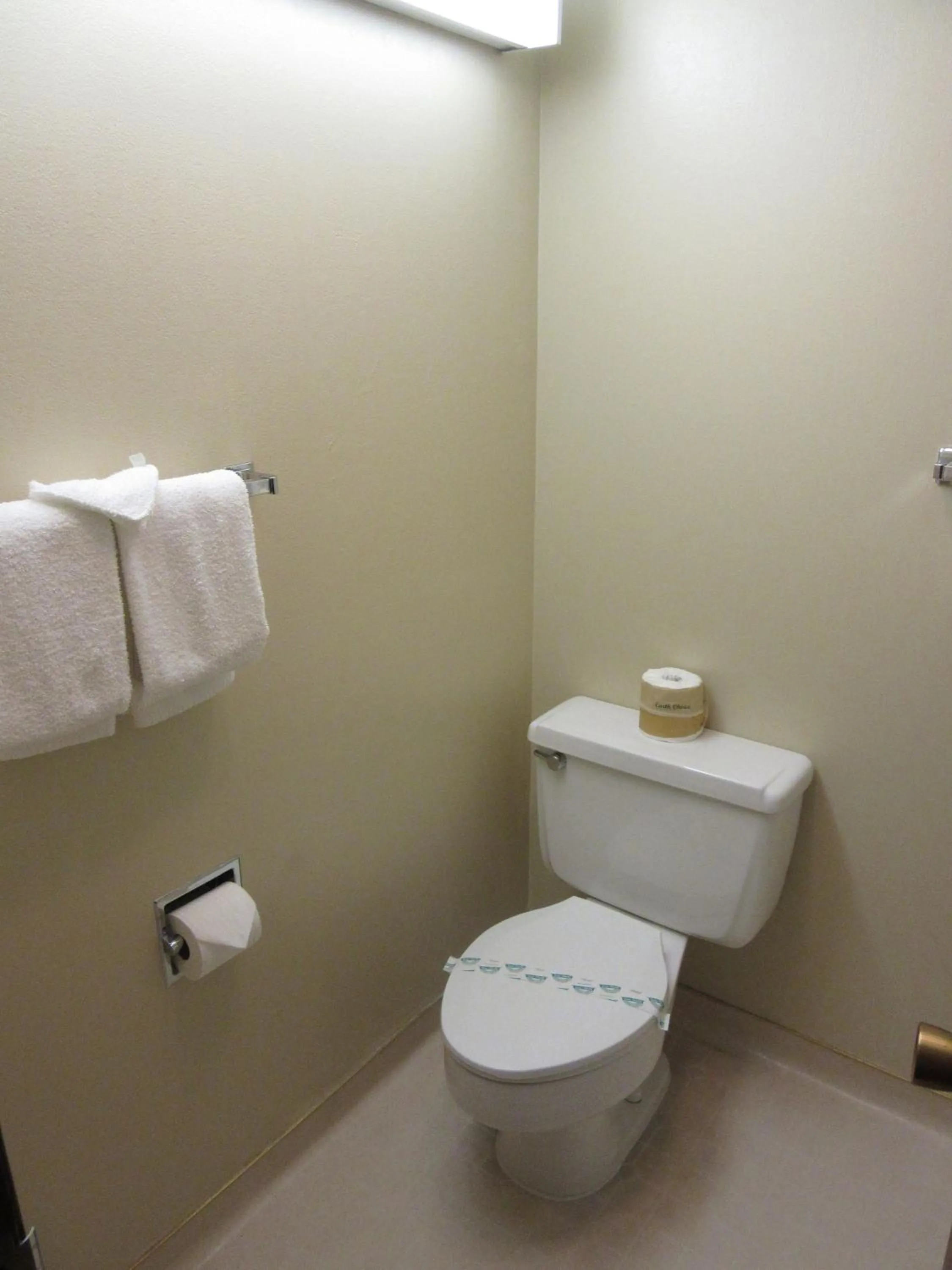 Toilet in Travelodge by Wyndham Kalispell