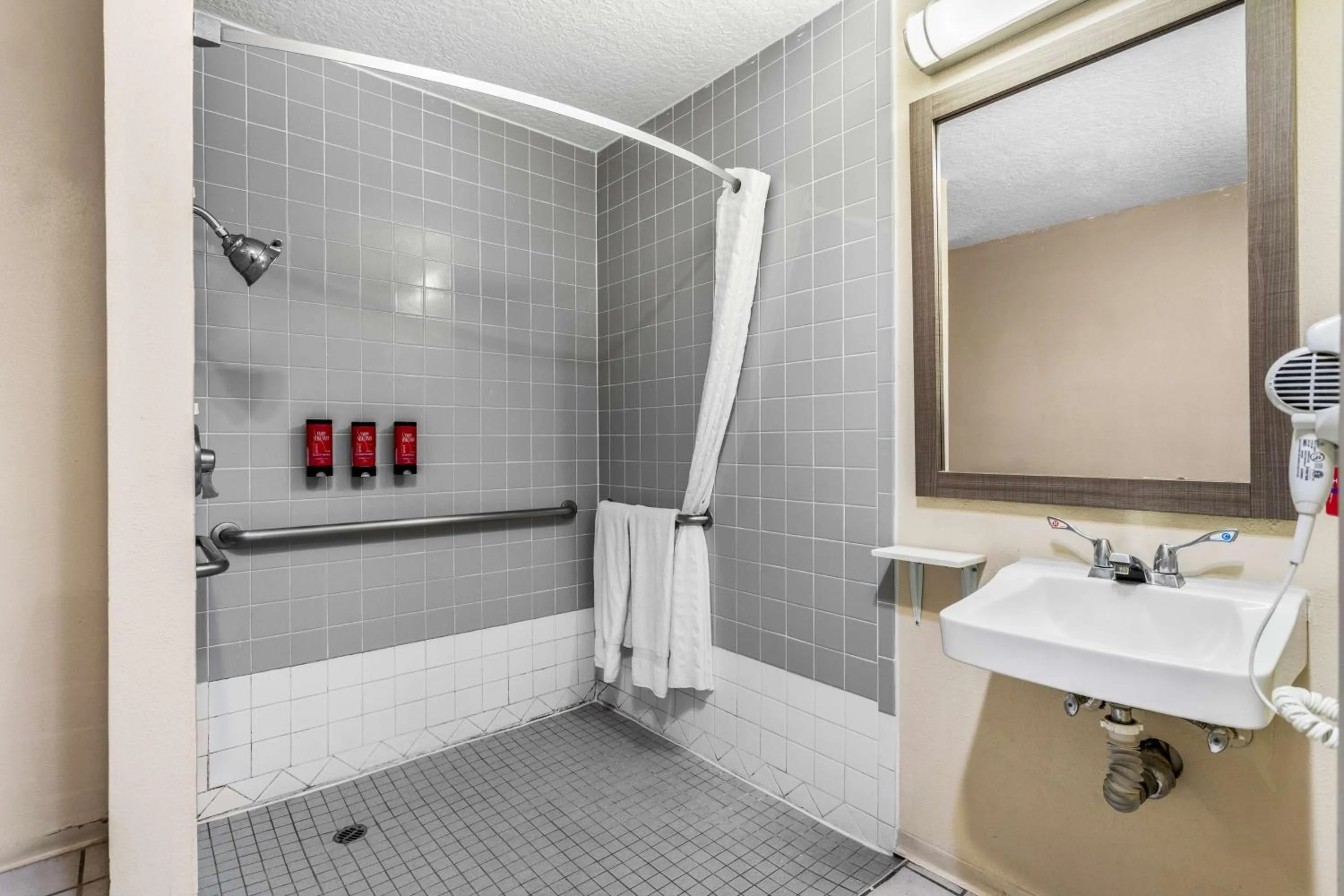 Bathroom in SureStay Hotel by Best Western Albuquerque Midtown