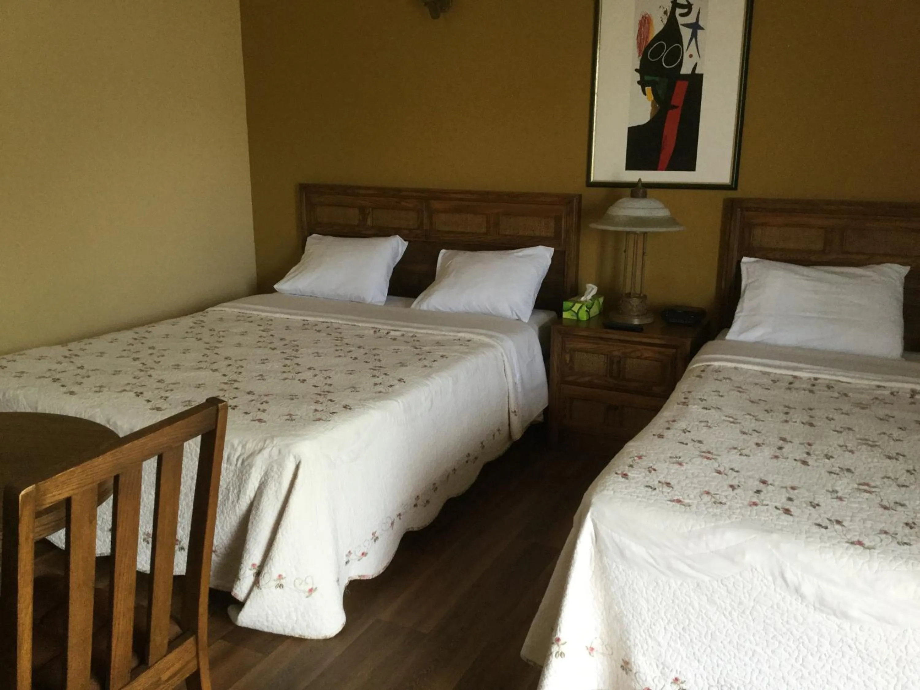 Bed in Hotel Motel Hospitalité