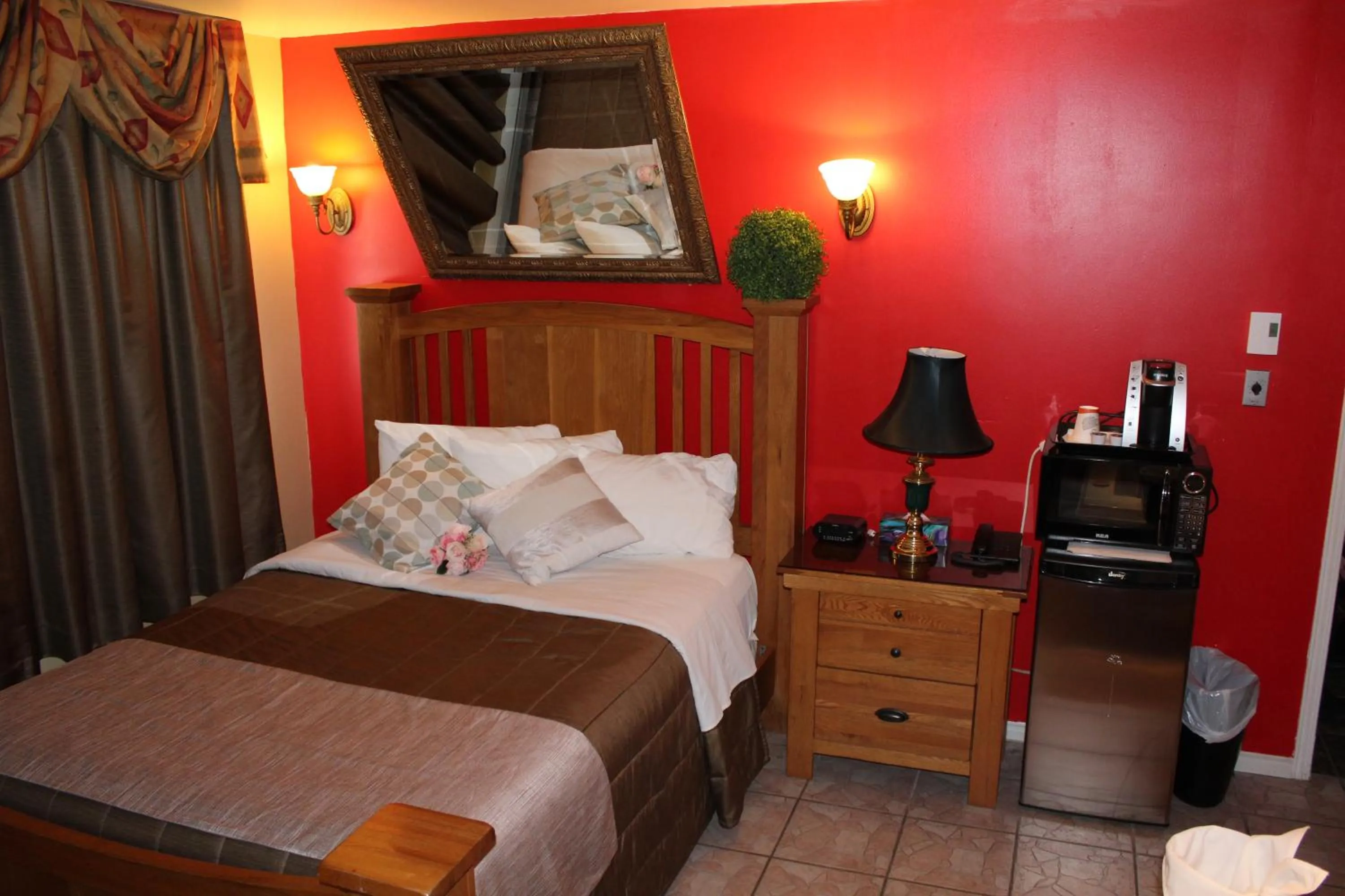 Bed in Hotel Motel Hospitalité