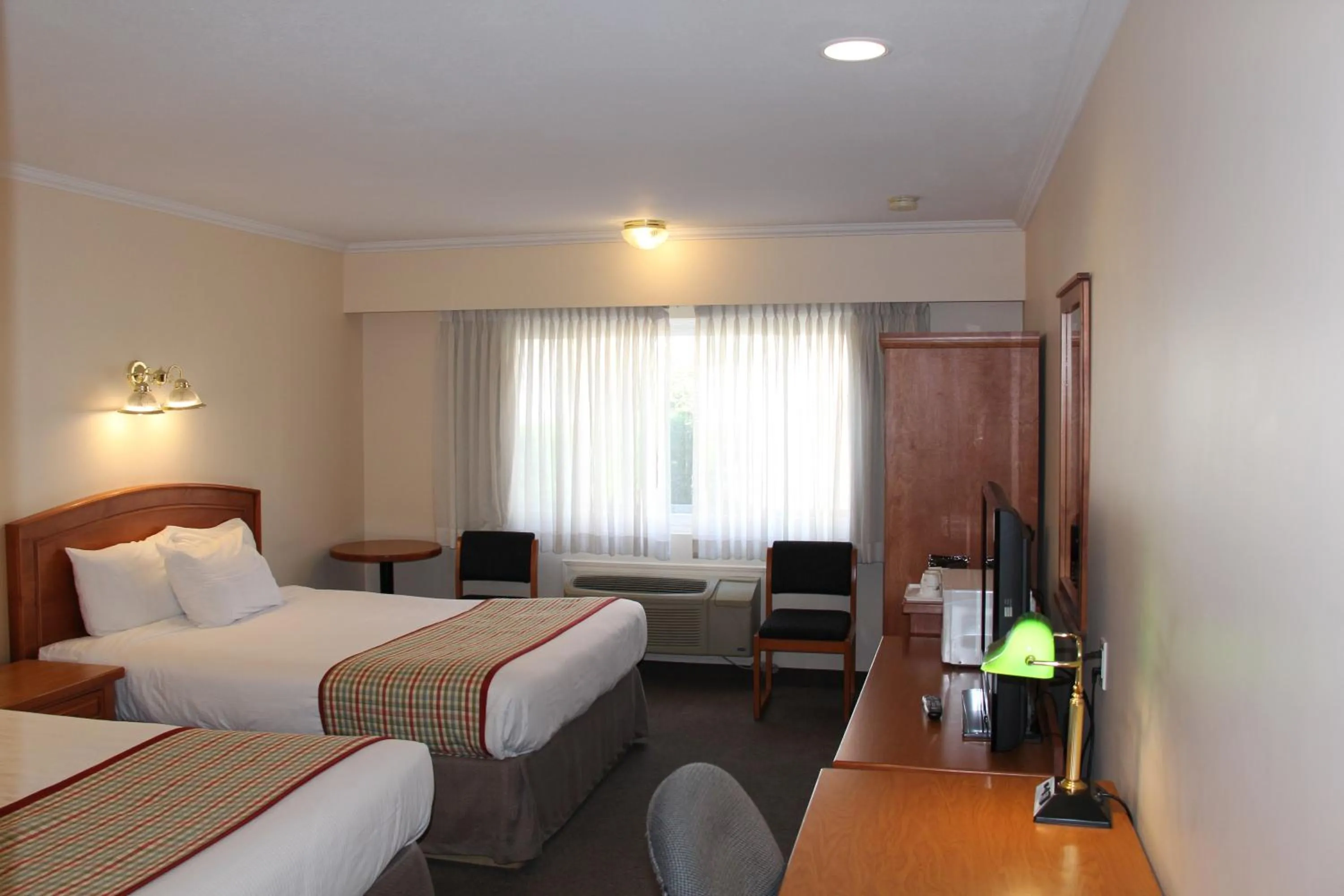 Bed in Travelodge by Wyndham Kamloops