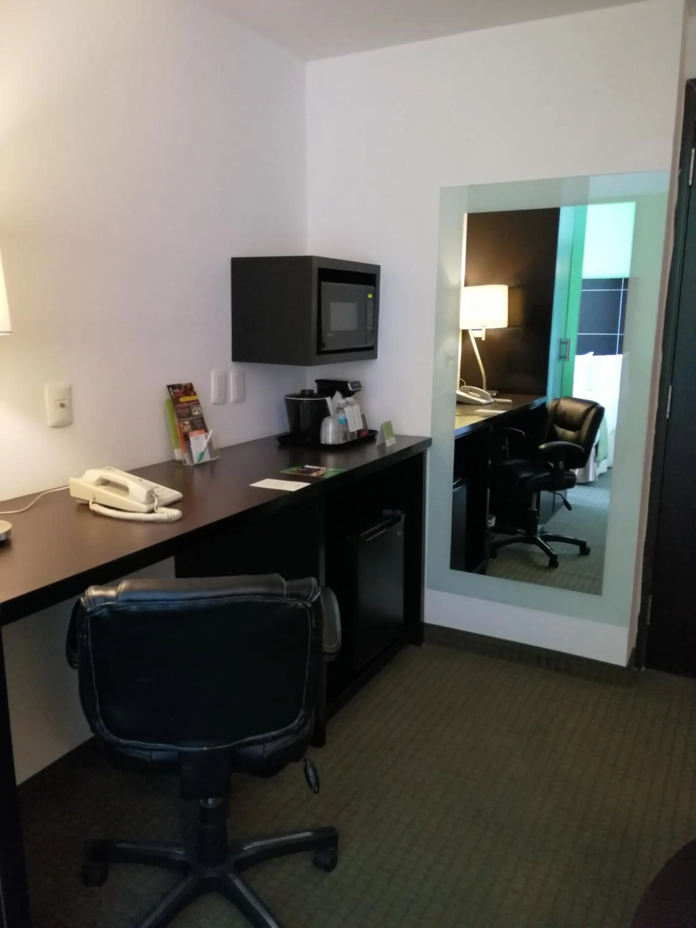 Seating area in La Quinta by Wyndham Puebla Palmas Angelopolis