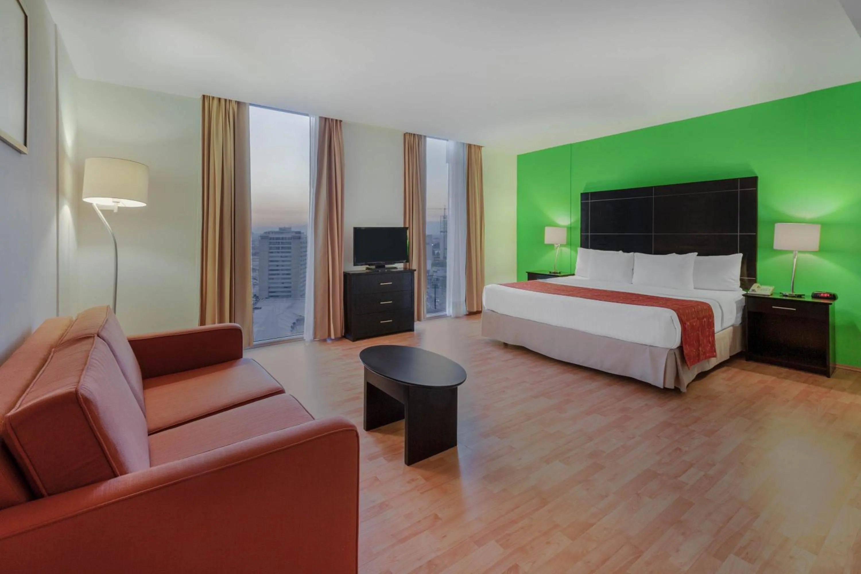 Photo of the whole room, Bed in La Quinta by Wyndham Puebla Palmas Angelopolis