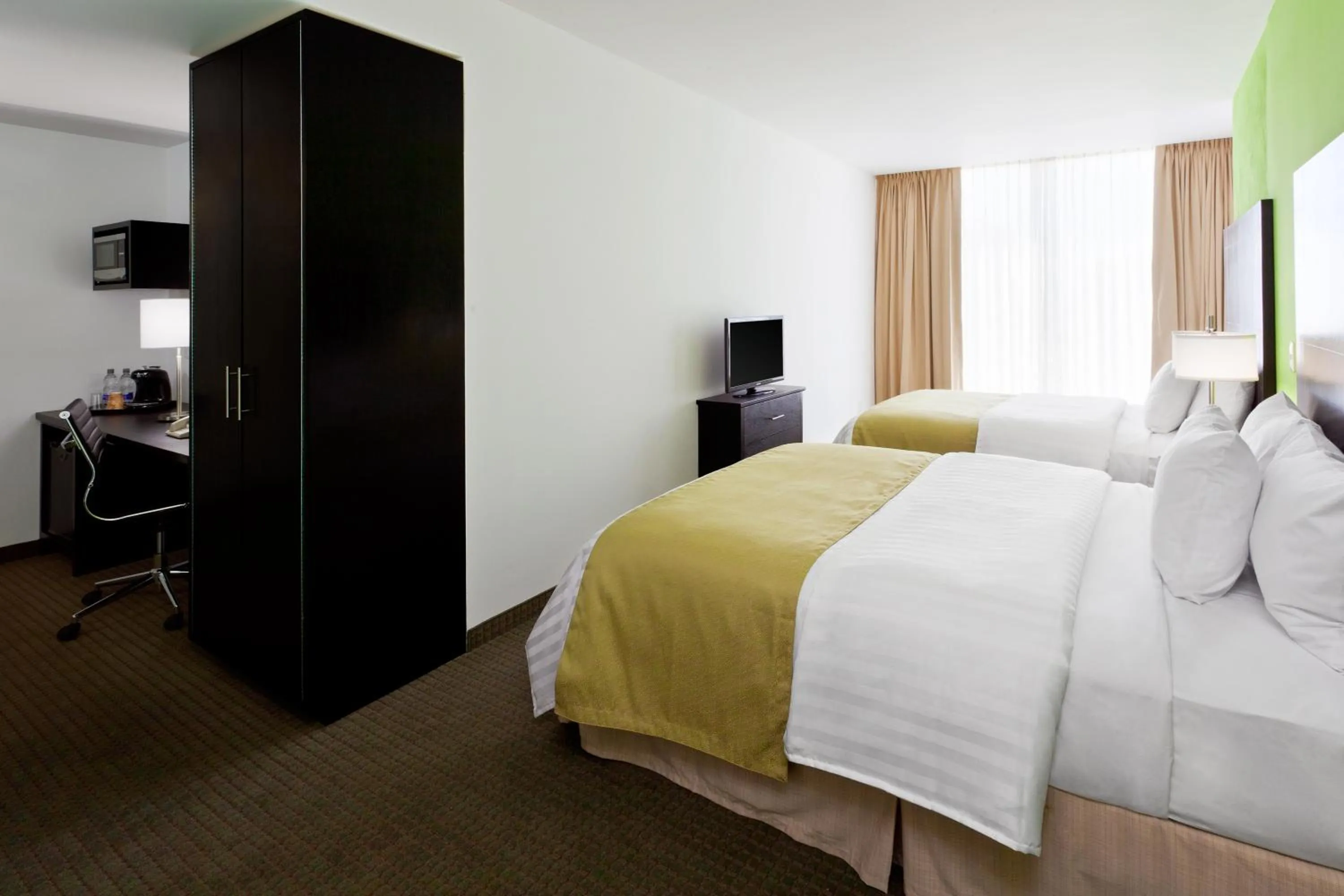 Bed in La Quinta by Wyndham Puebla Palmas Angelopolis