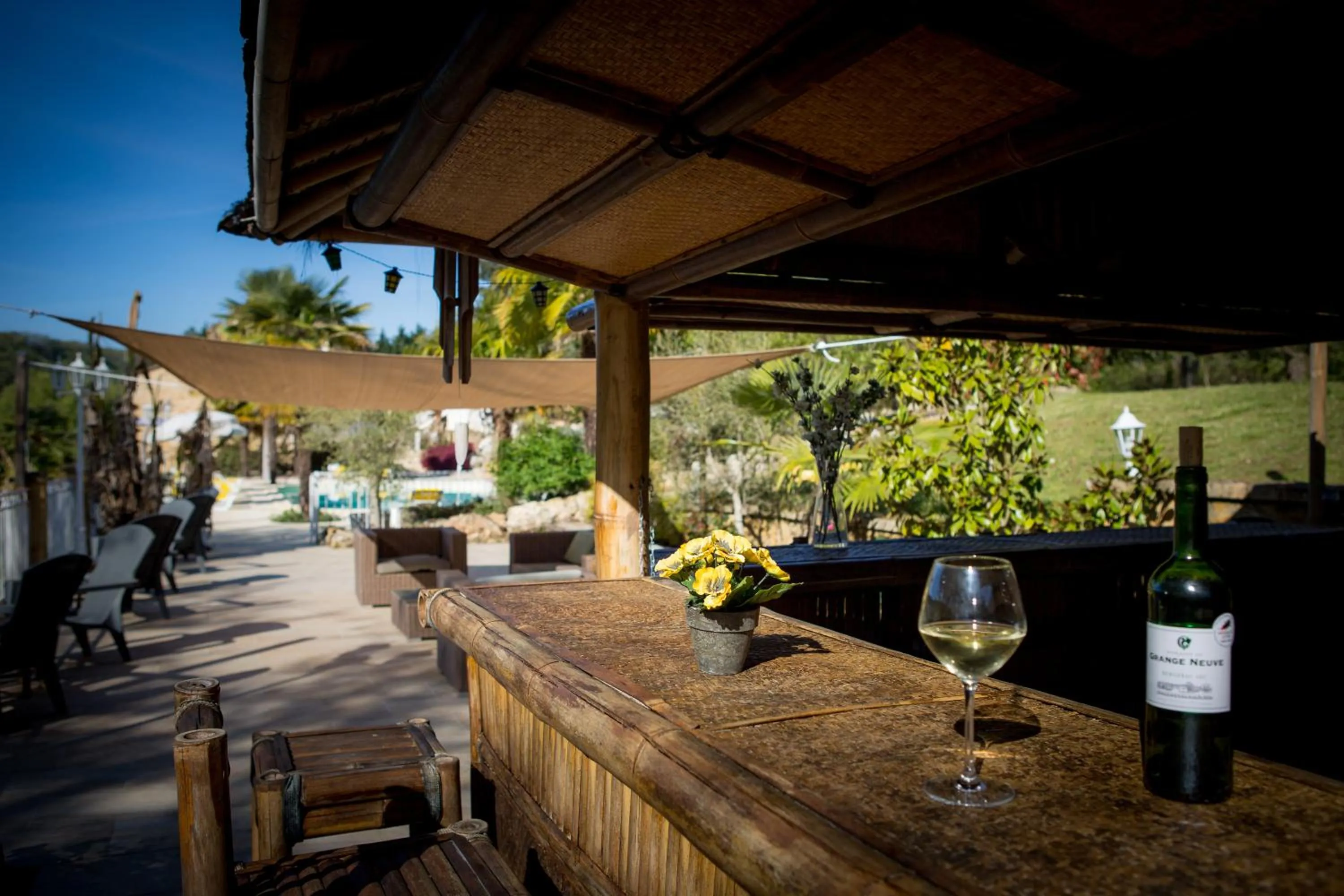 Lounge or bar in Les Magnolias holiday homes
