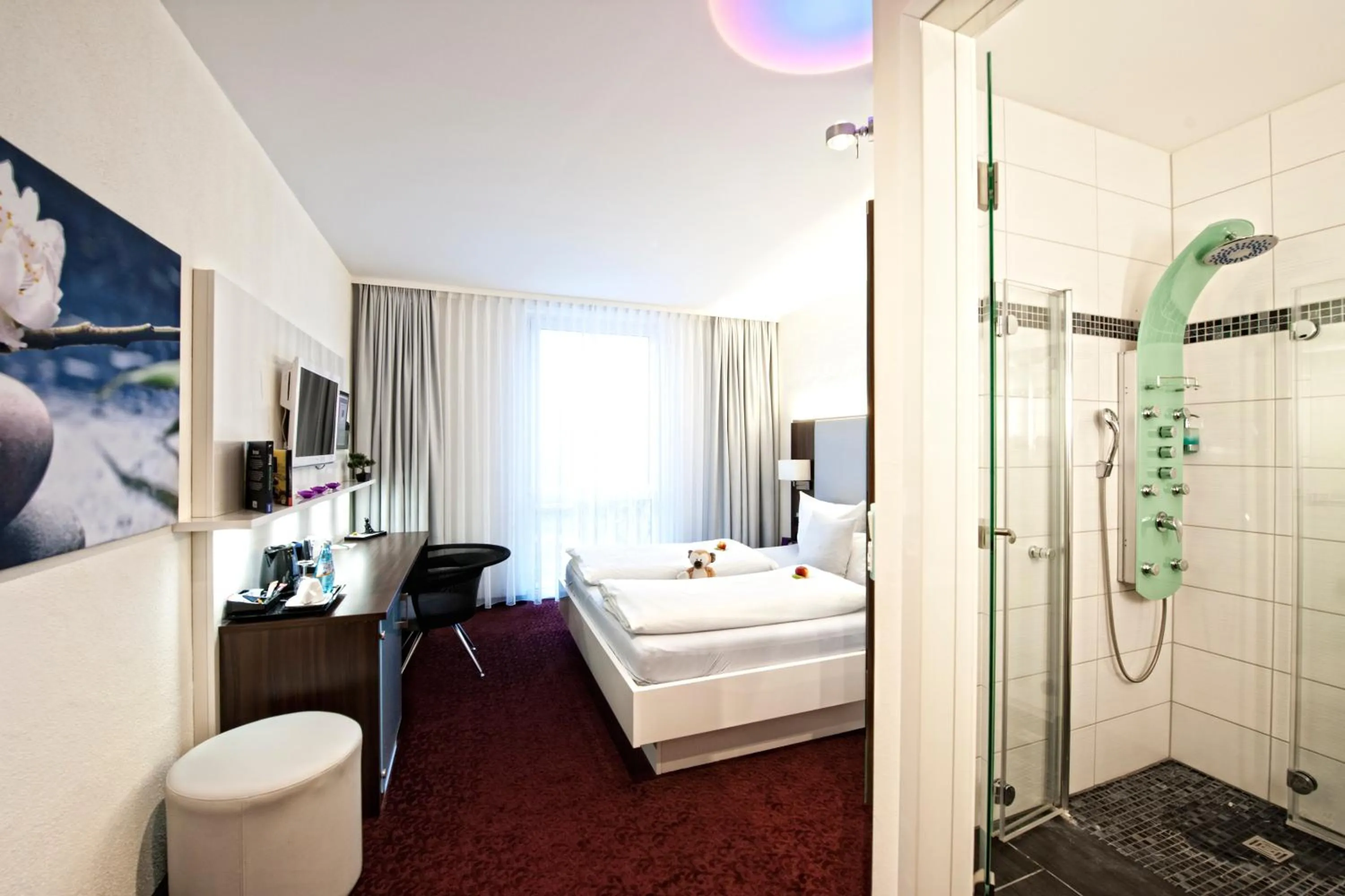 Seating area, Bed in Hotel Jungstil