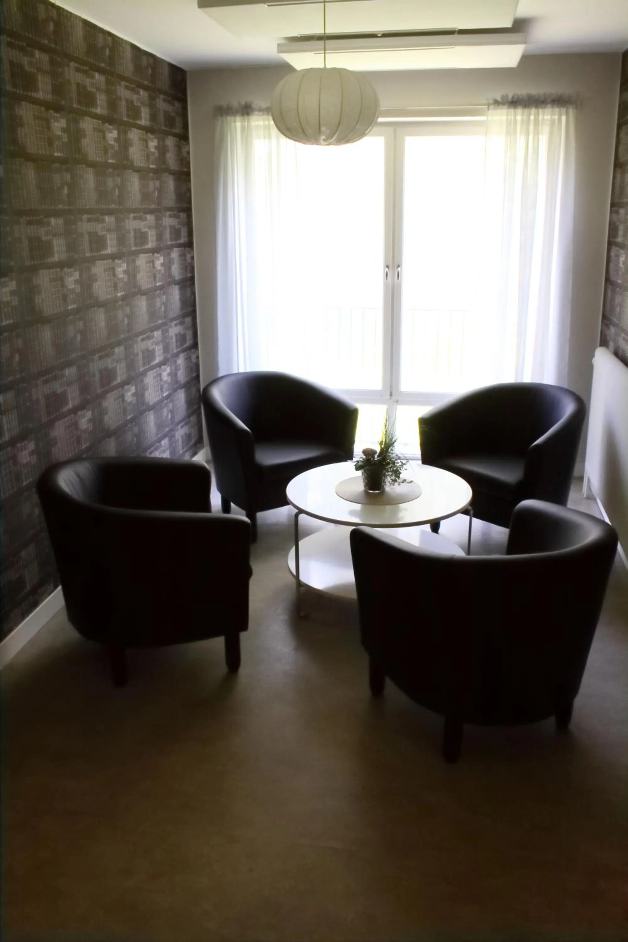 Seating area in Ekbackens Vandrarhem