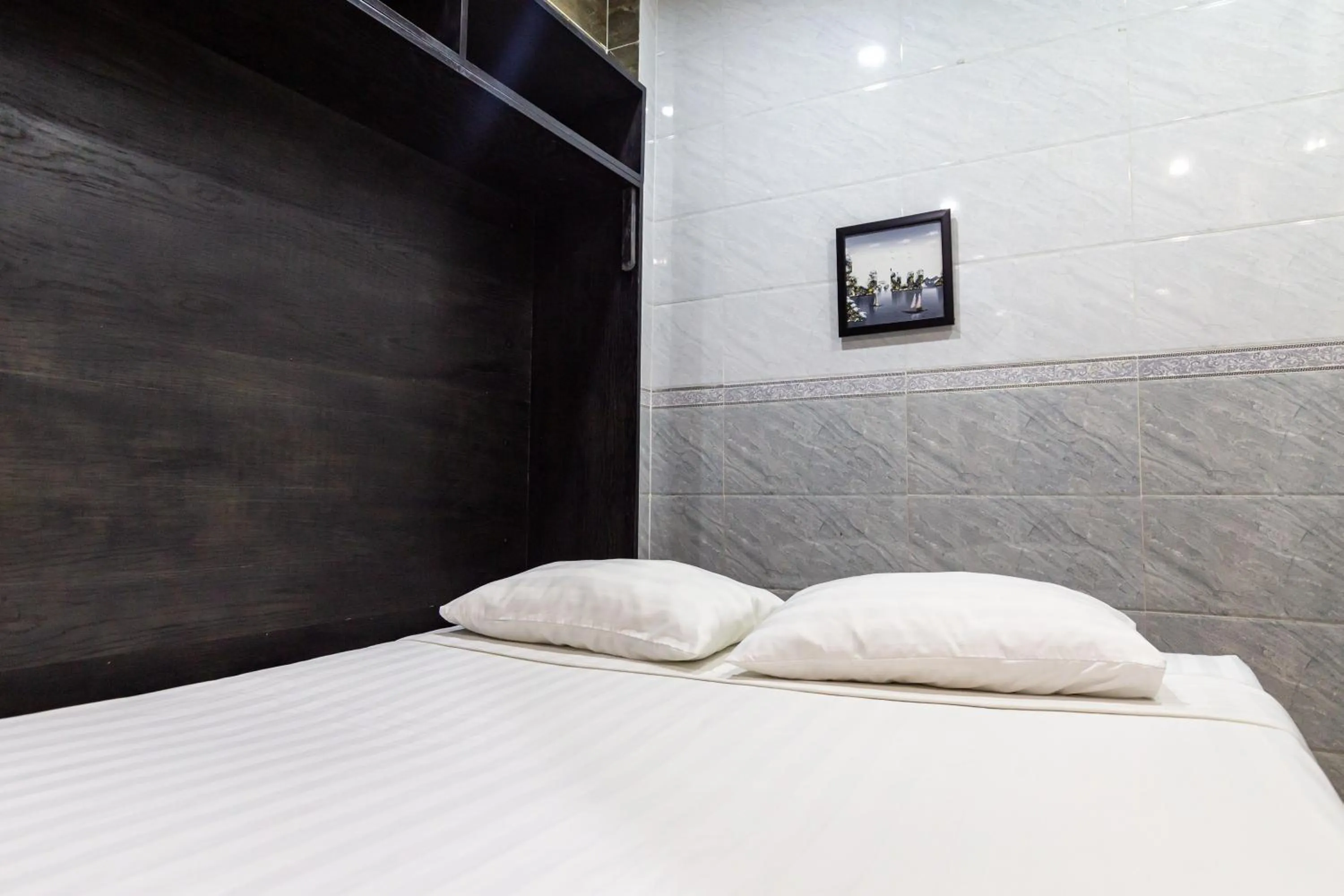 Bed in Cola's Homestay