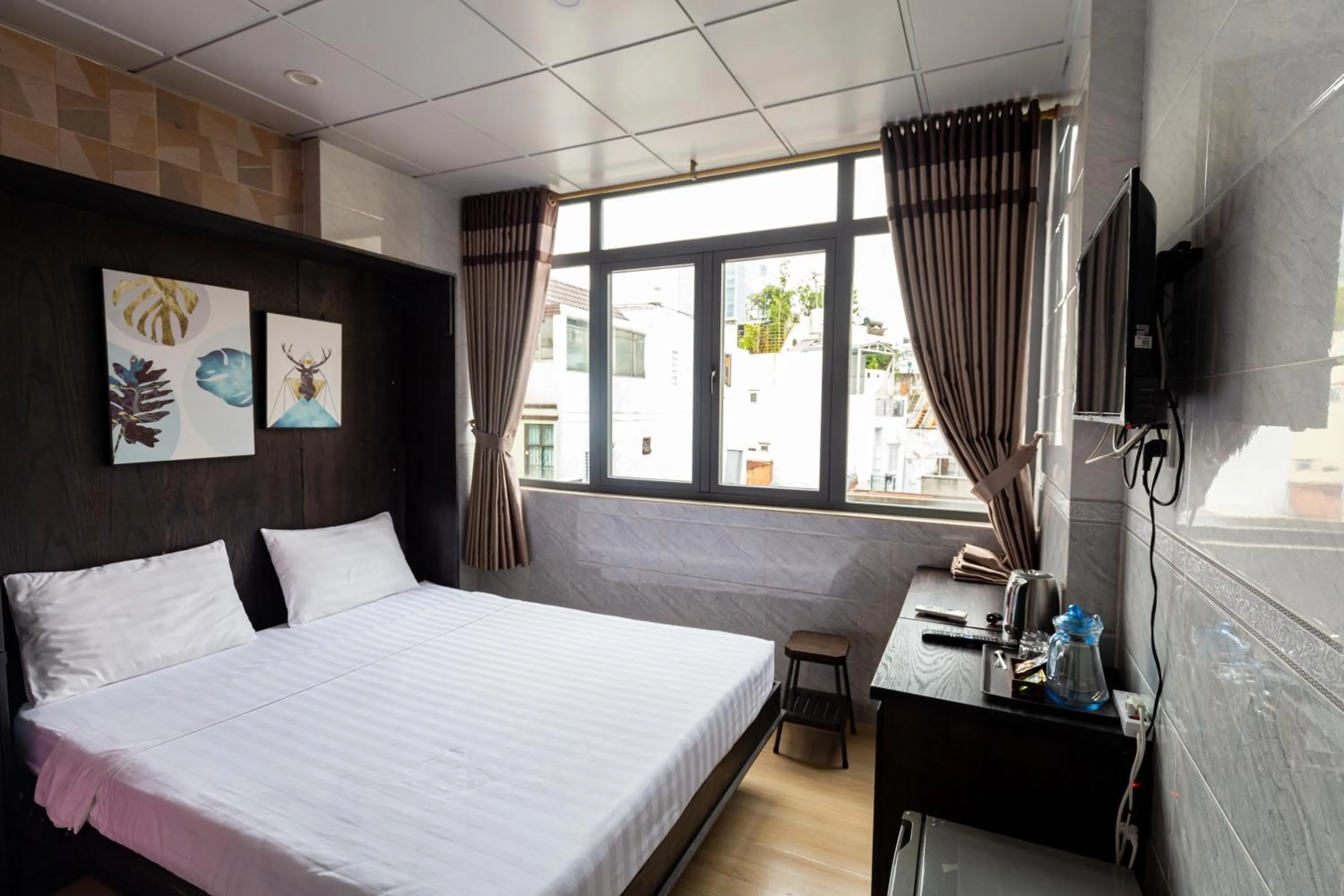 Photo of the whole room, Bed in Cola's Homestay