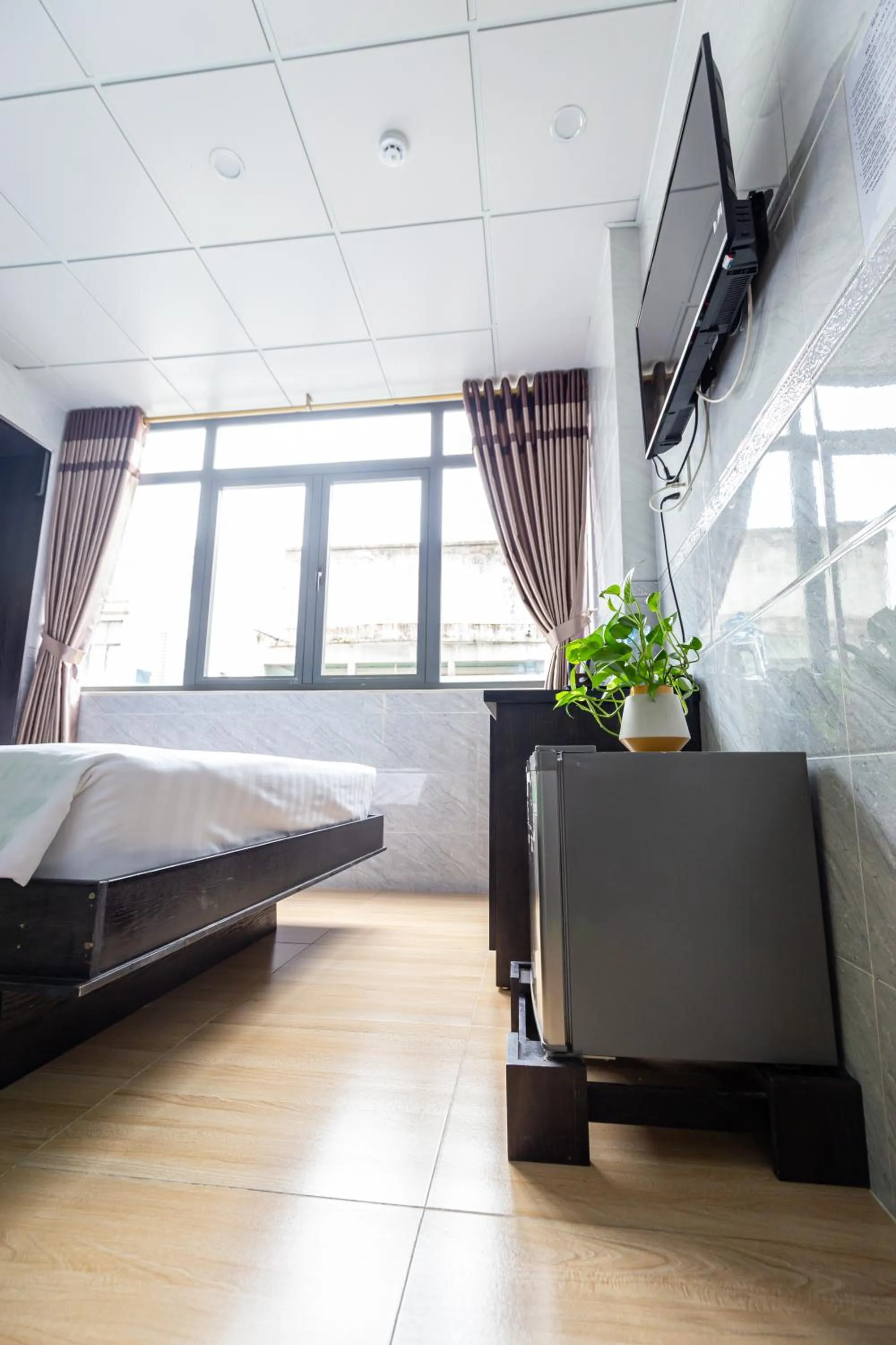 Photo of the whole room, Bed in Cola's Homestay