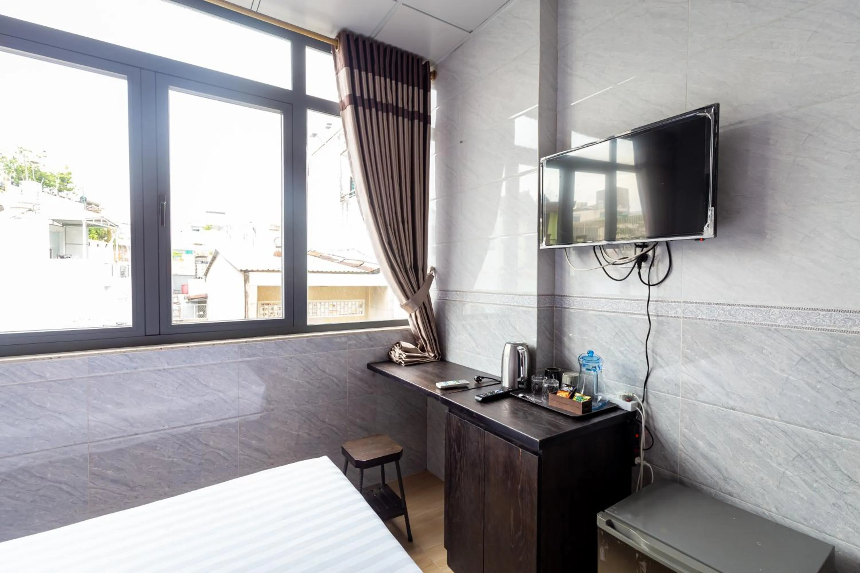 Photo of the whole room, Bed in Cola's Homestay