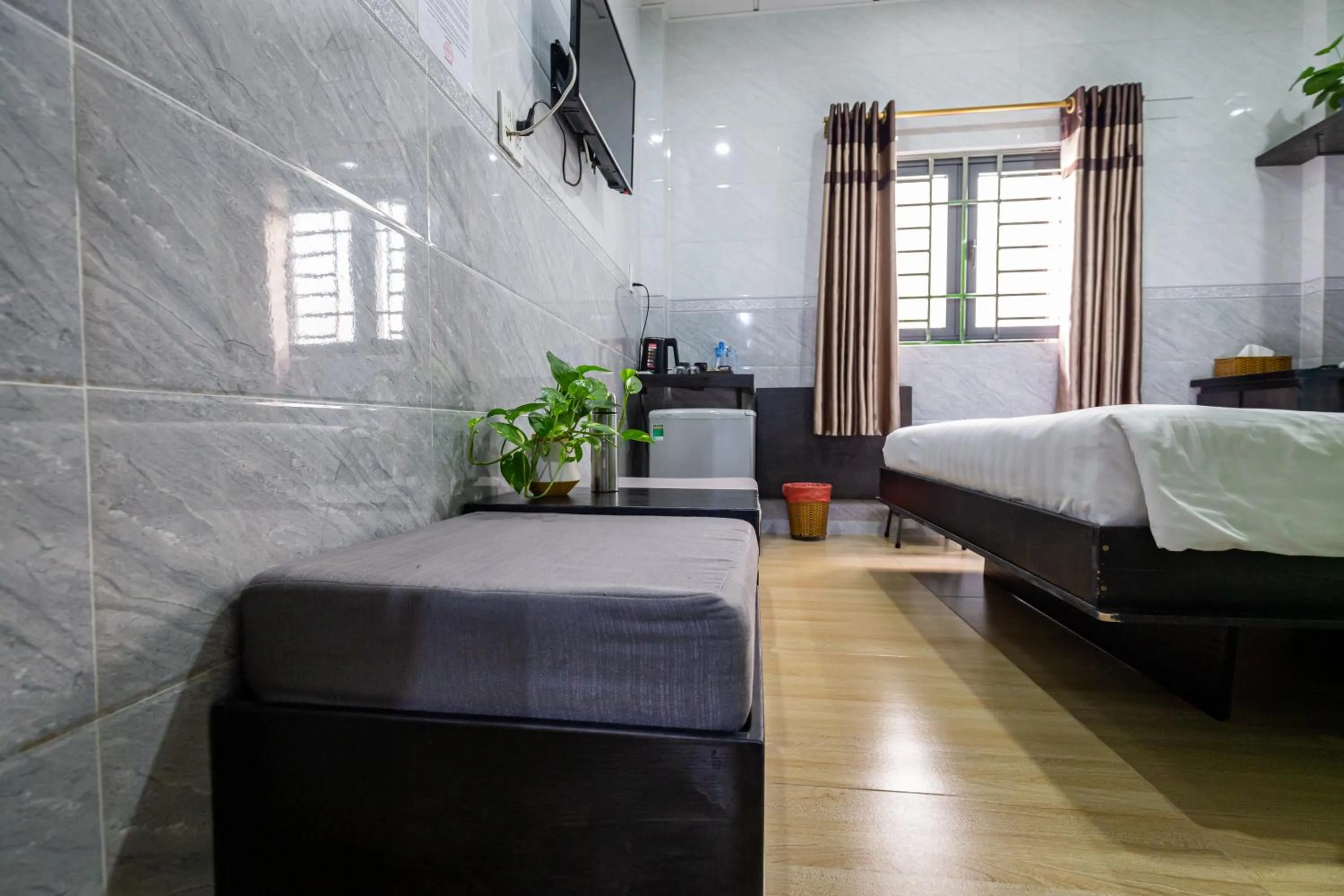 Photo of the whole room, Bed in Cola's Homestay