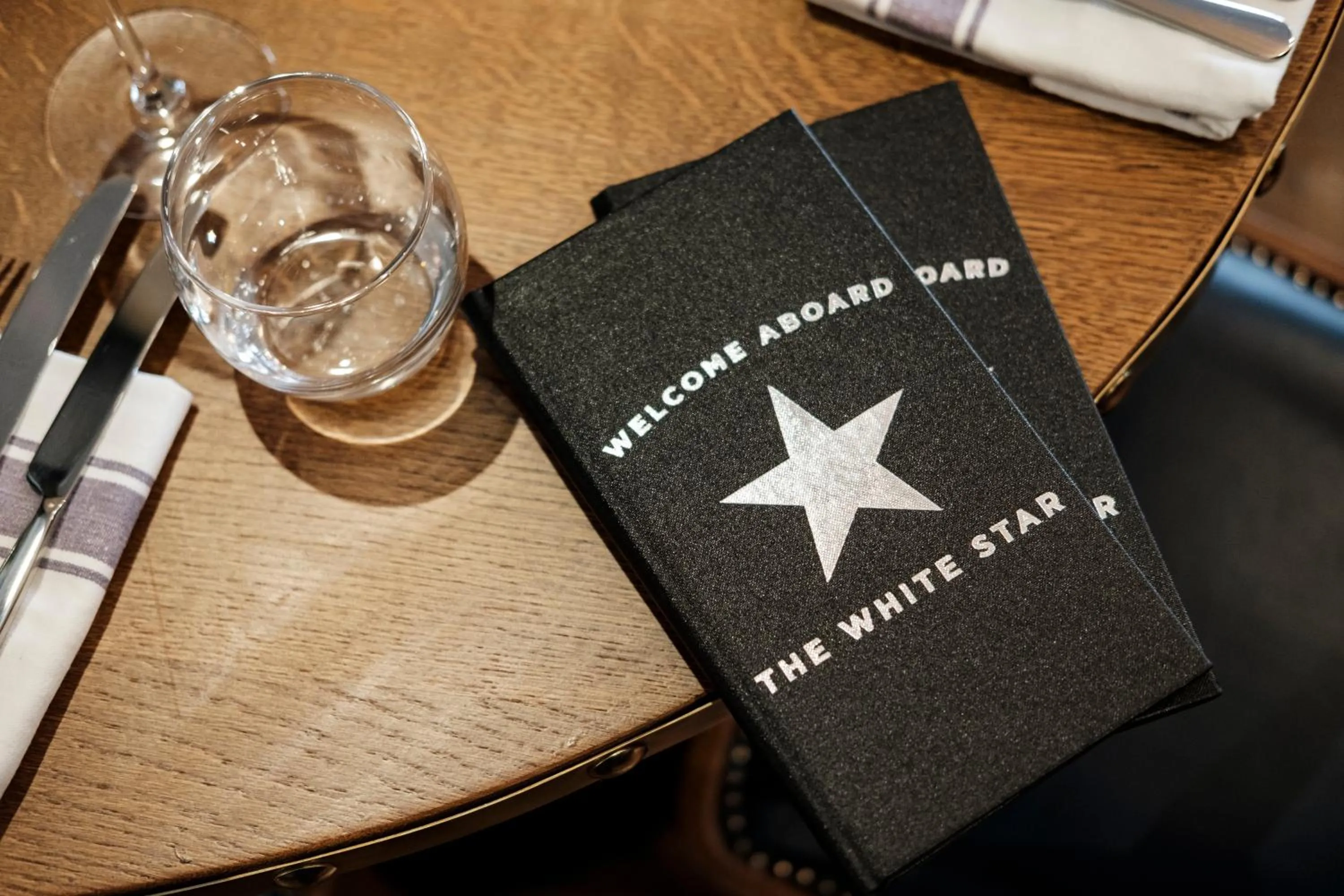 Property logo or sign in The White Star Tavern