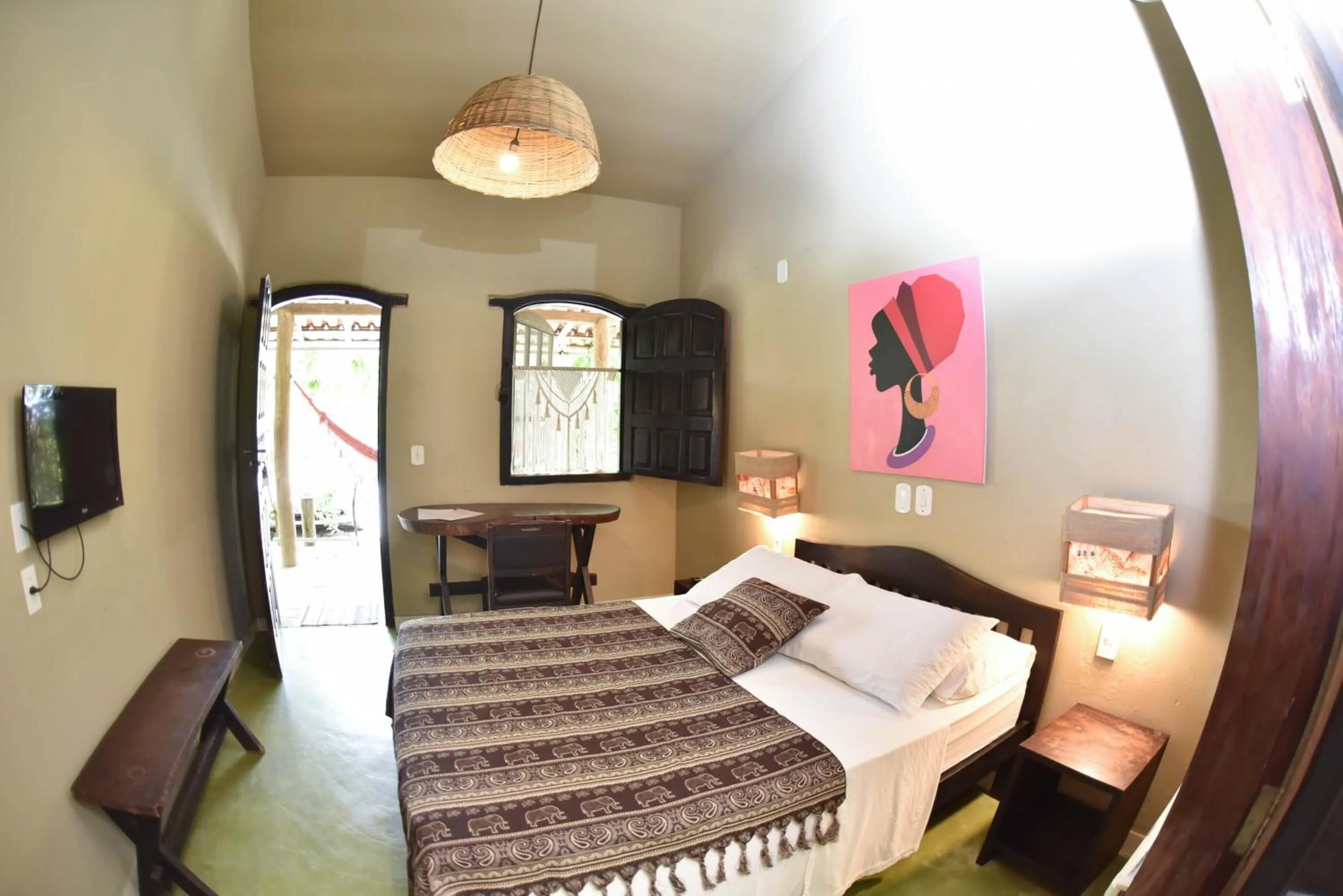 Bed in Pousada Tubarão