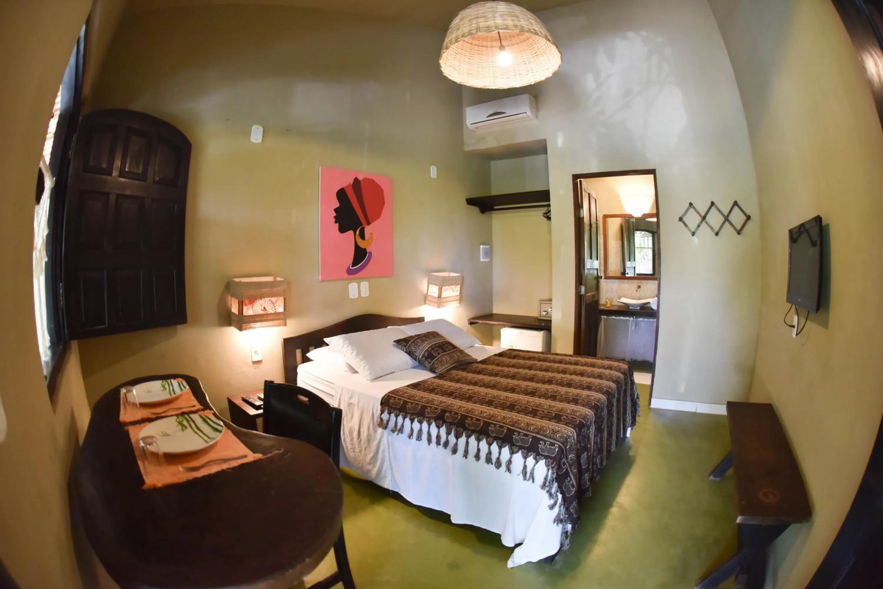 Bed in Pousada Tubarão