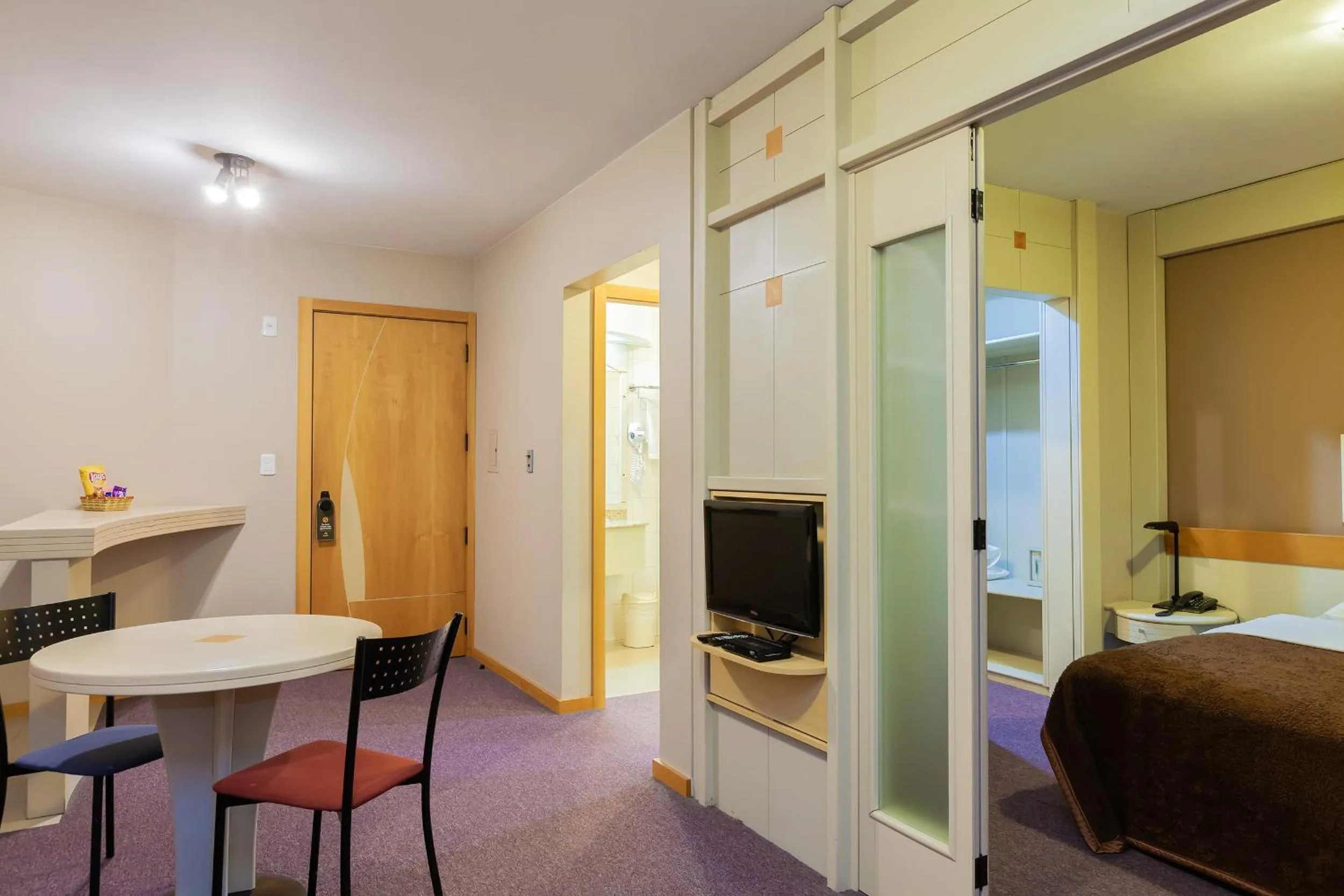 TV and multimedia in Tri Hotel & Flat Caxias