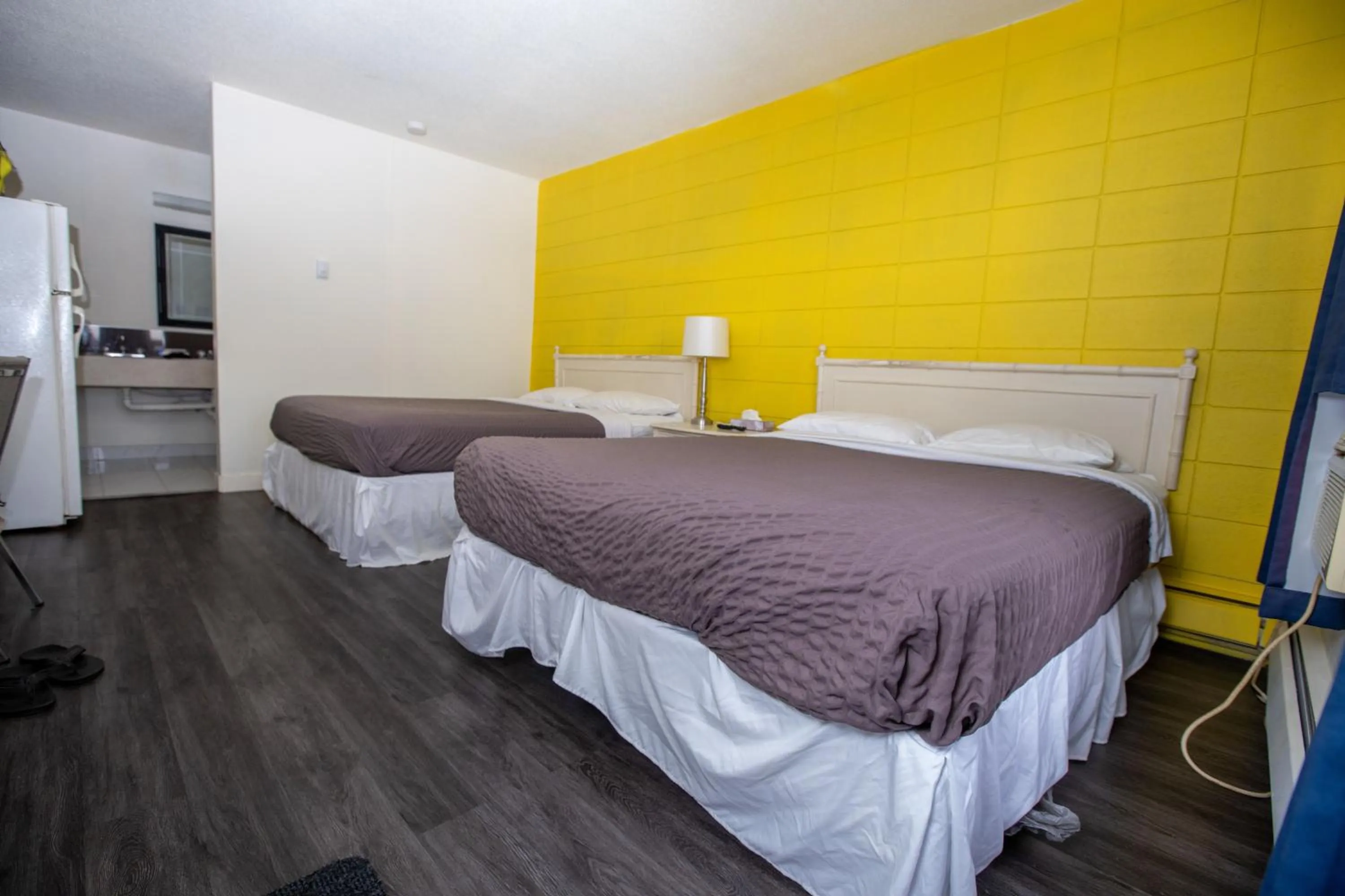 Bed in Camrose Motel