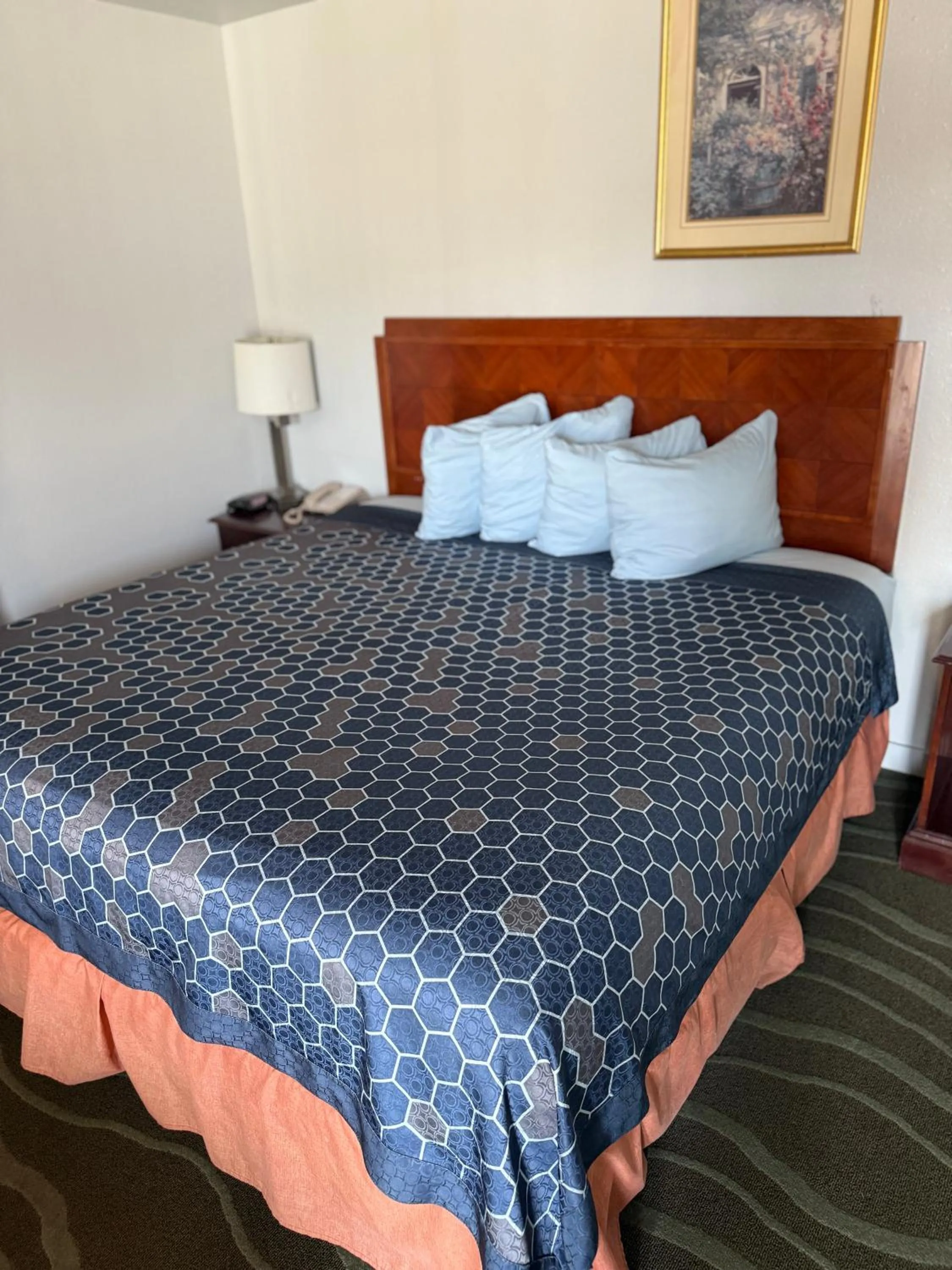 Bed in La Hacienda Motel