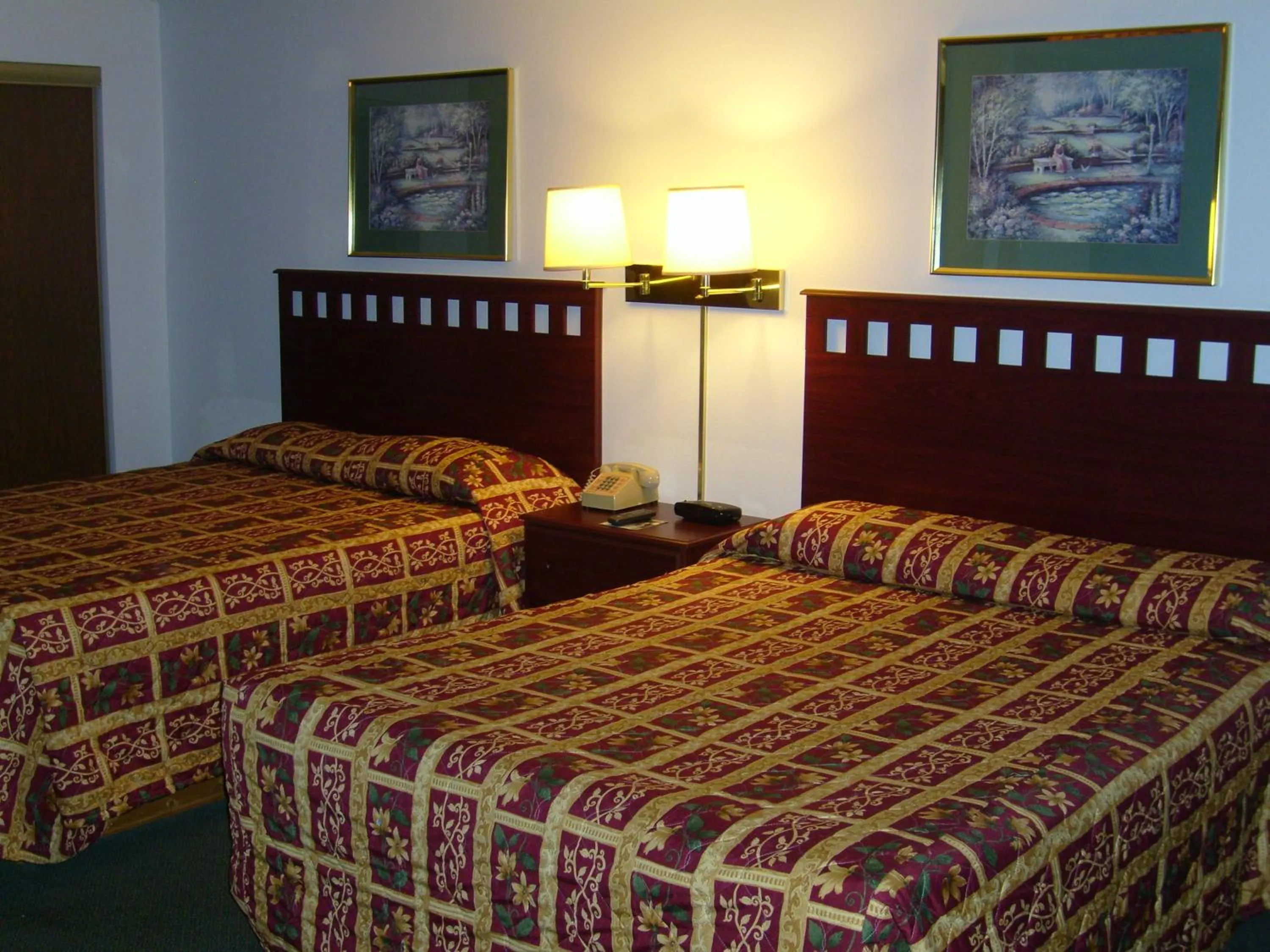 Bed in Shanico Inn