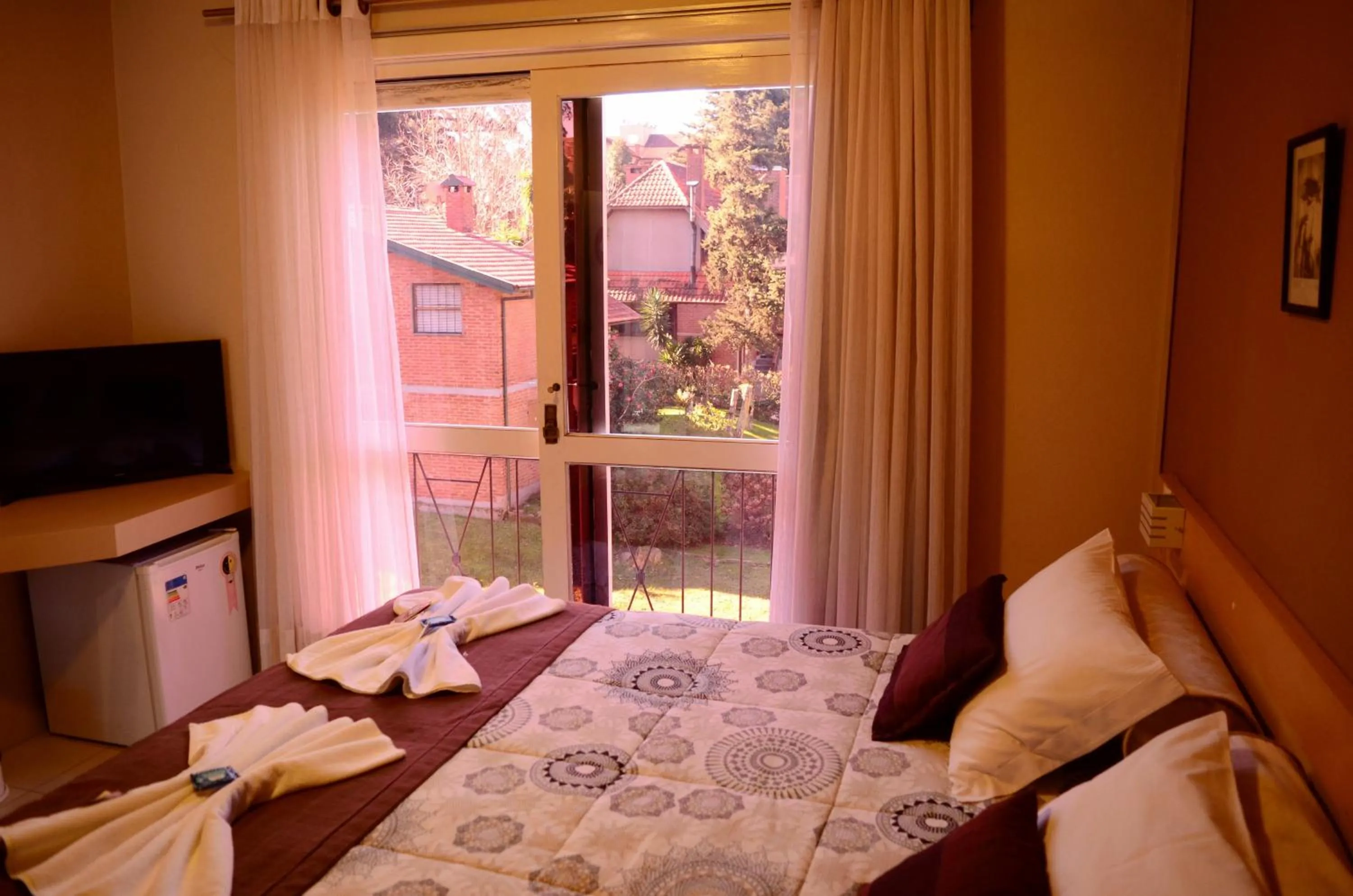 Bed in Pousada Tango