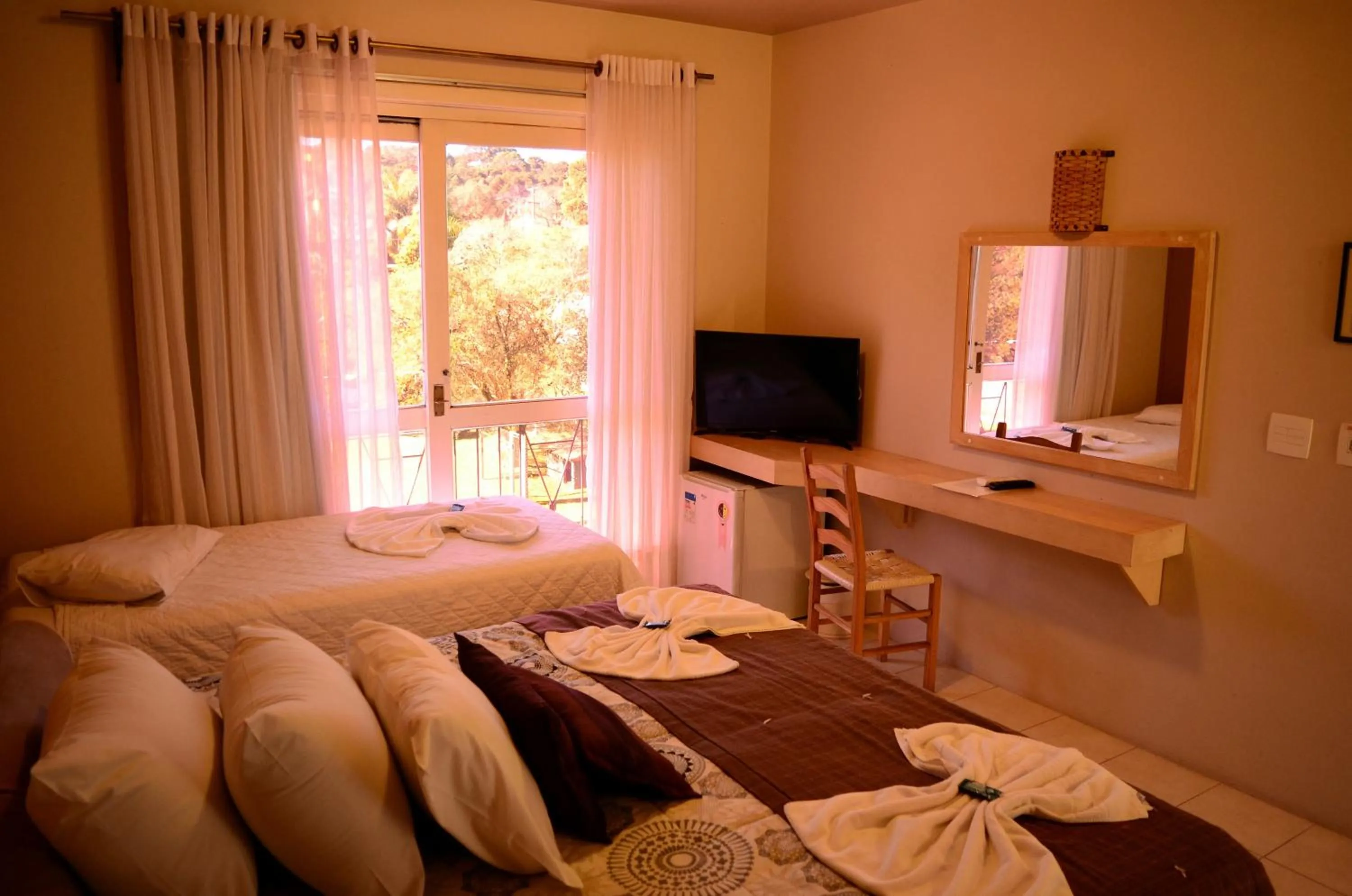 Bed in Pousada Tango