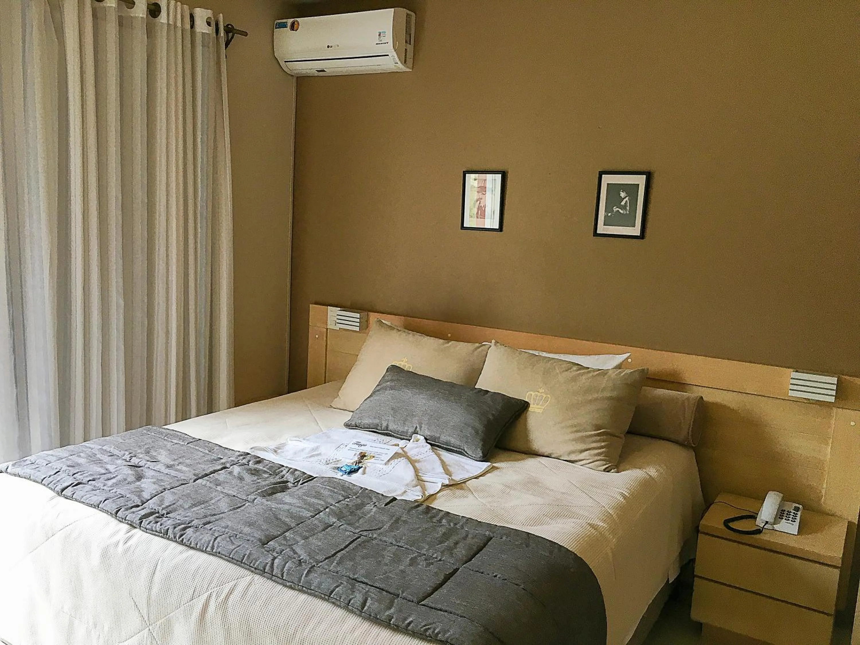 Bed in Pousada Tango