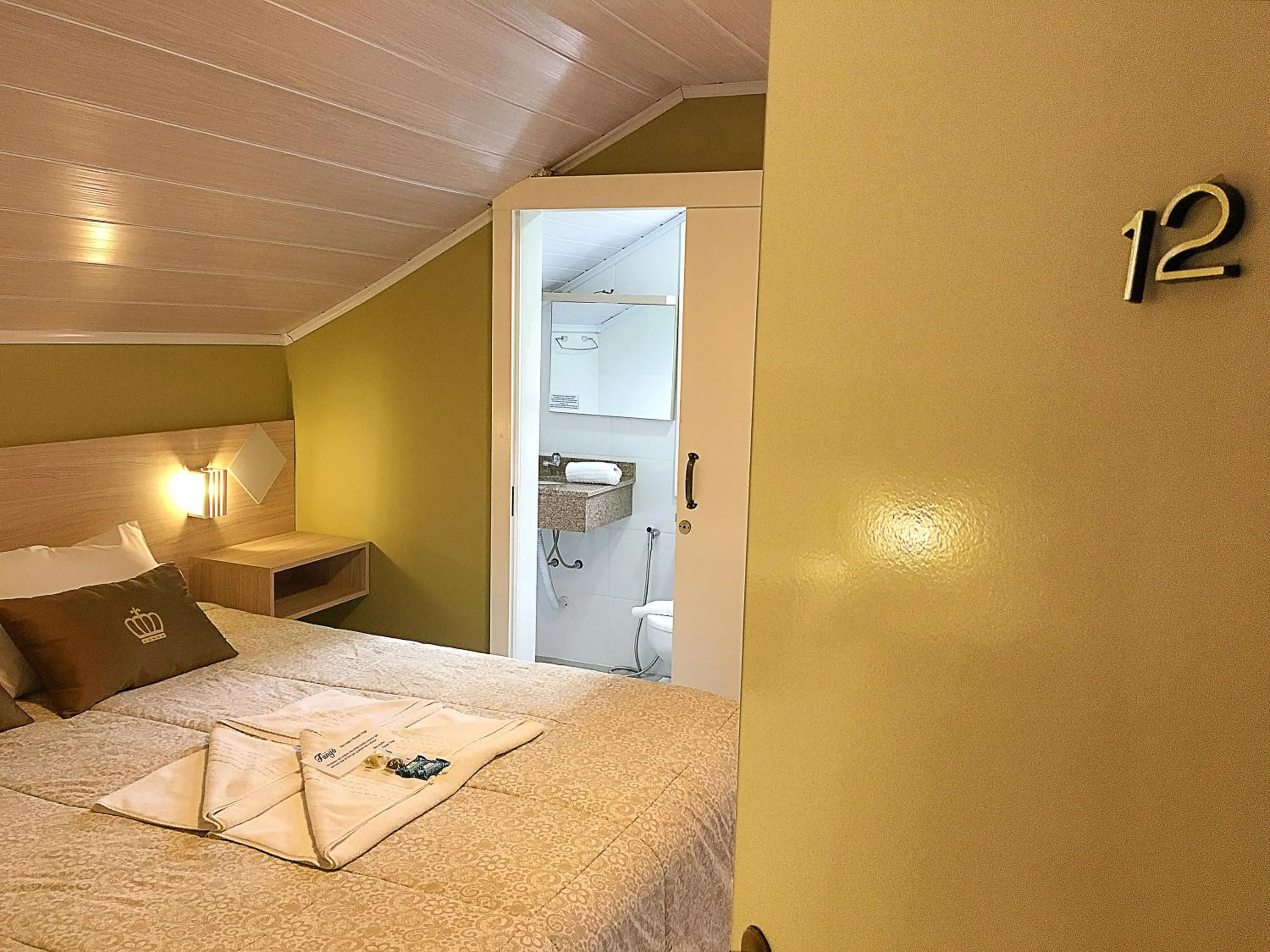 Bed in Pousada Tango