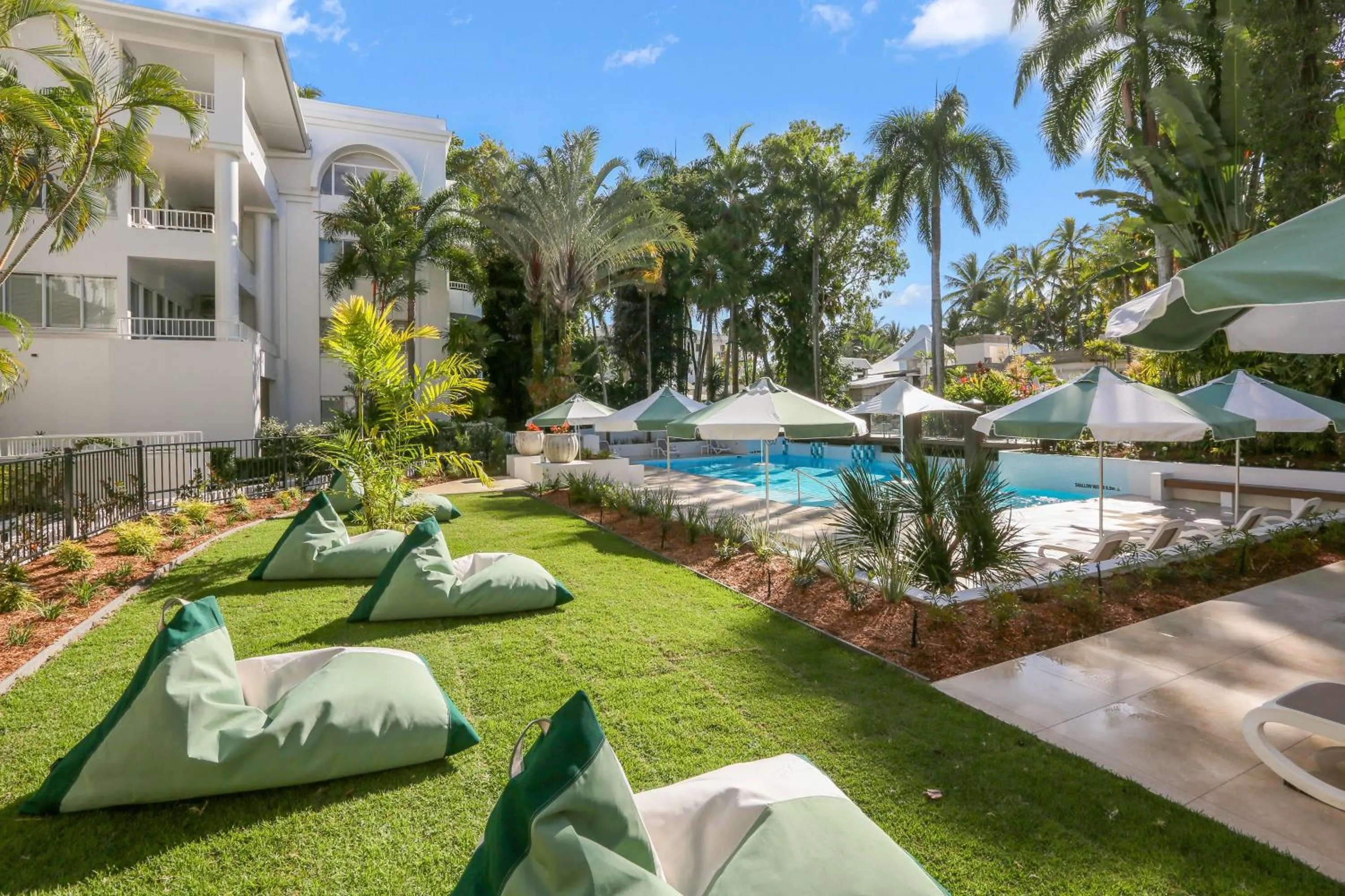 Swimming pool in Alamanda Palm Cove by Lancemore