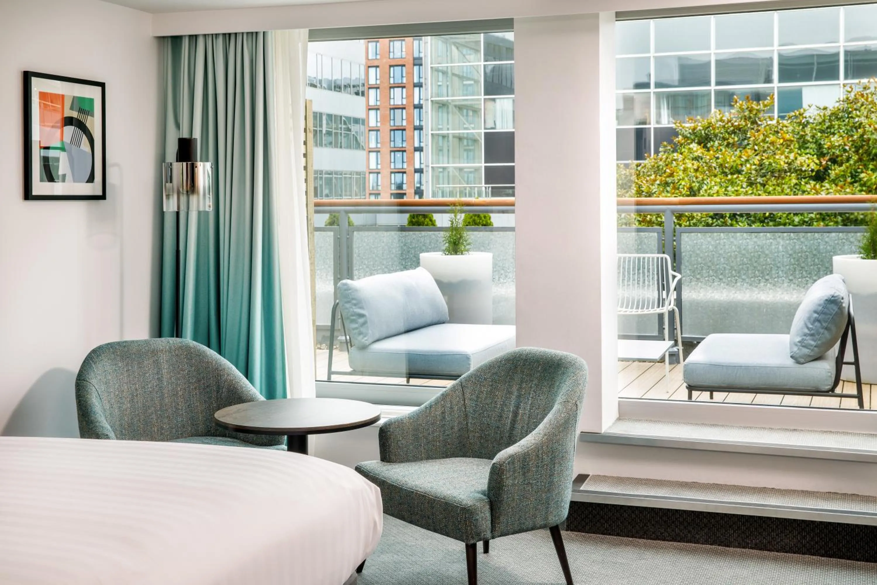 Seating area in Holiday Inn Milton Keynes Central by IHG