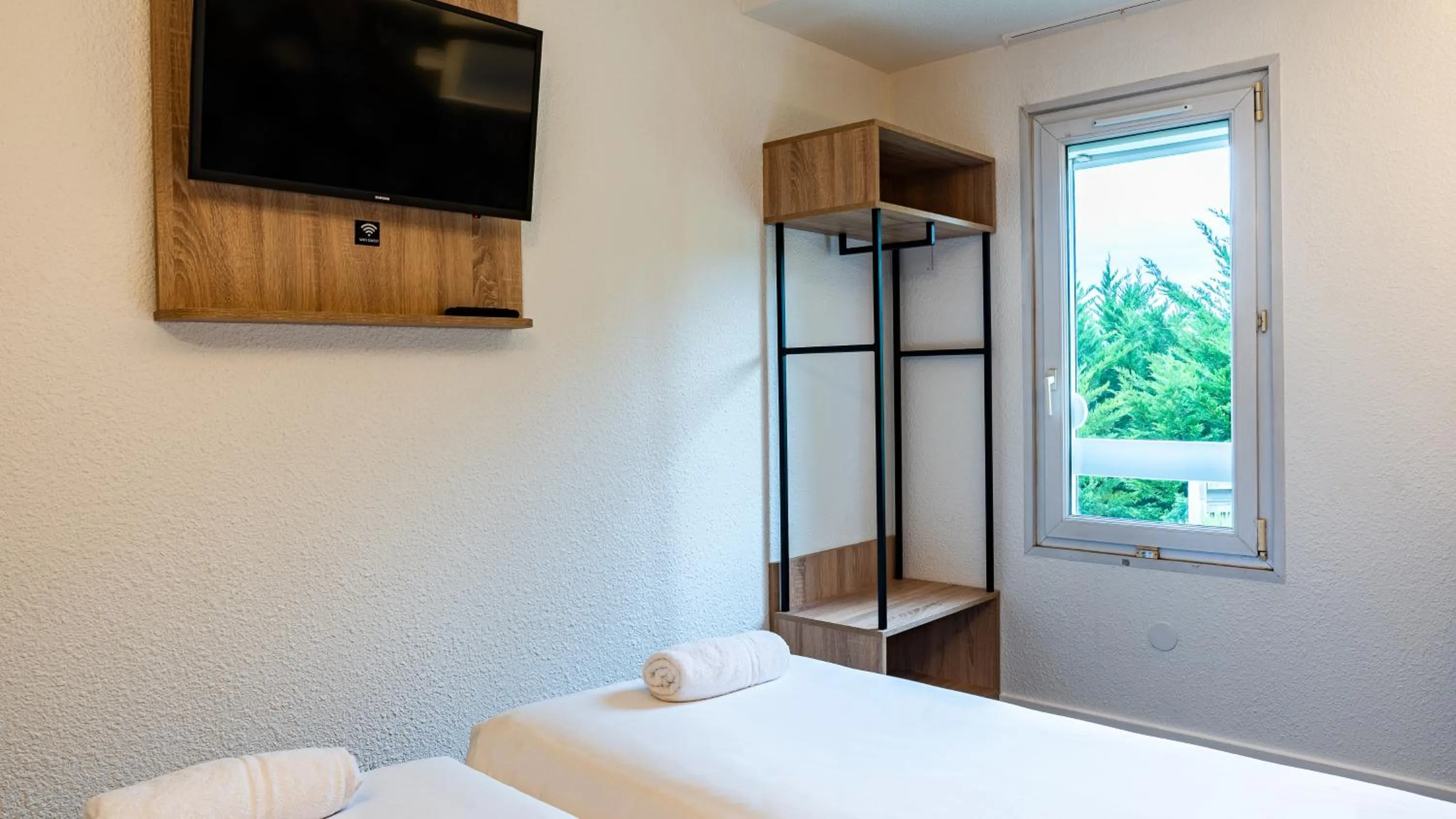 Bed in Quick Palace Anglet