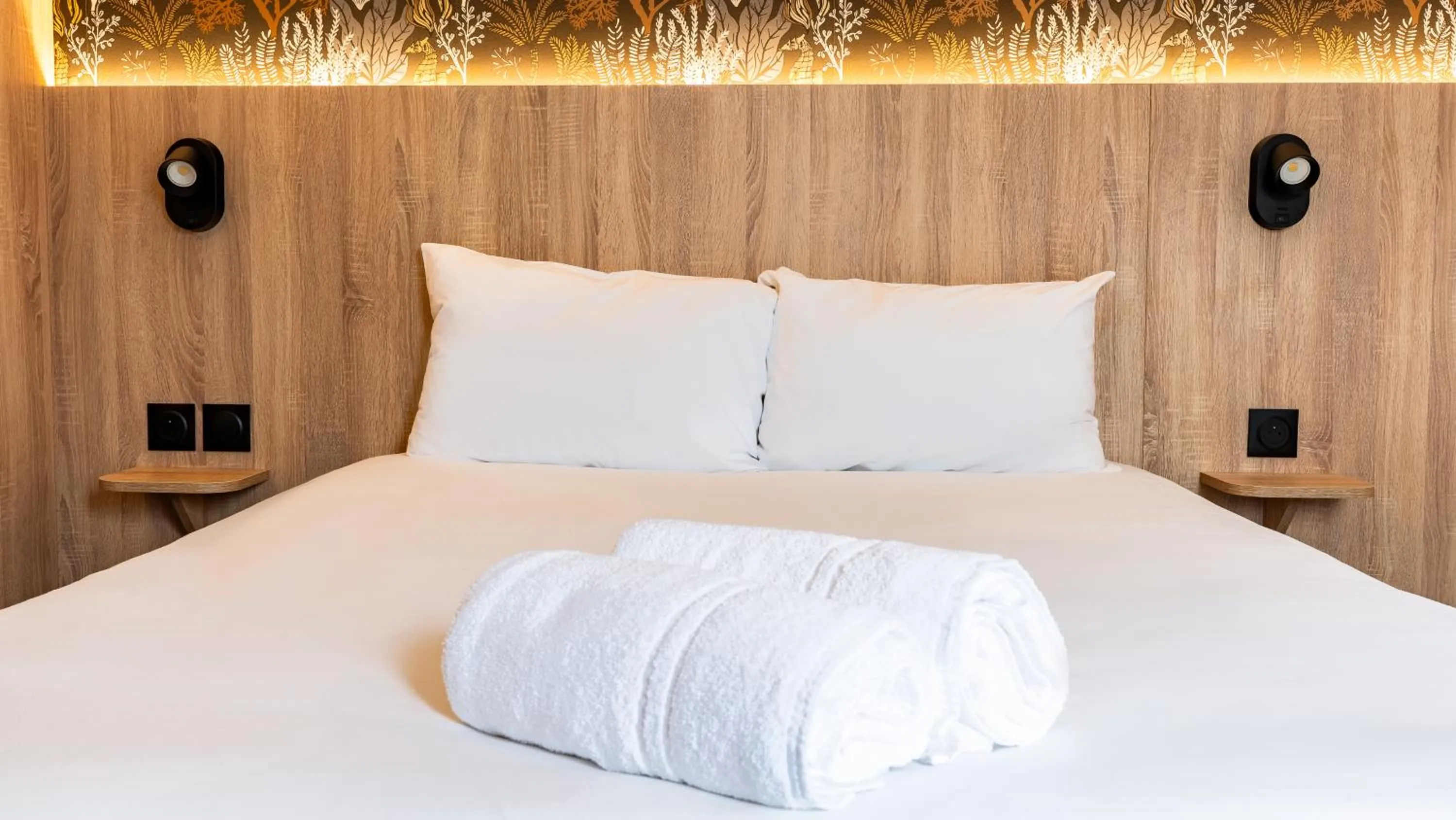 Bed in Quick Palace Anglet