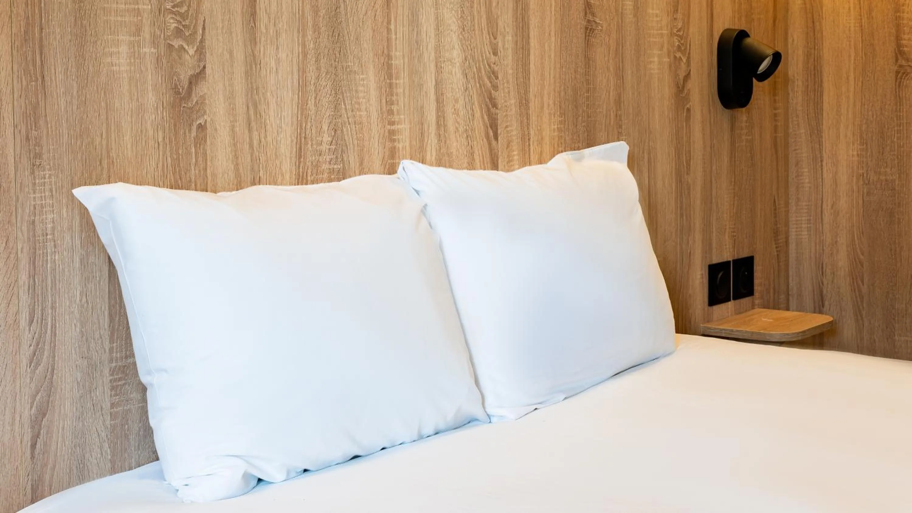 Bed in Quick Palace Anglet