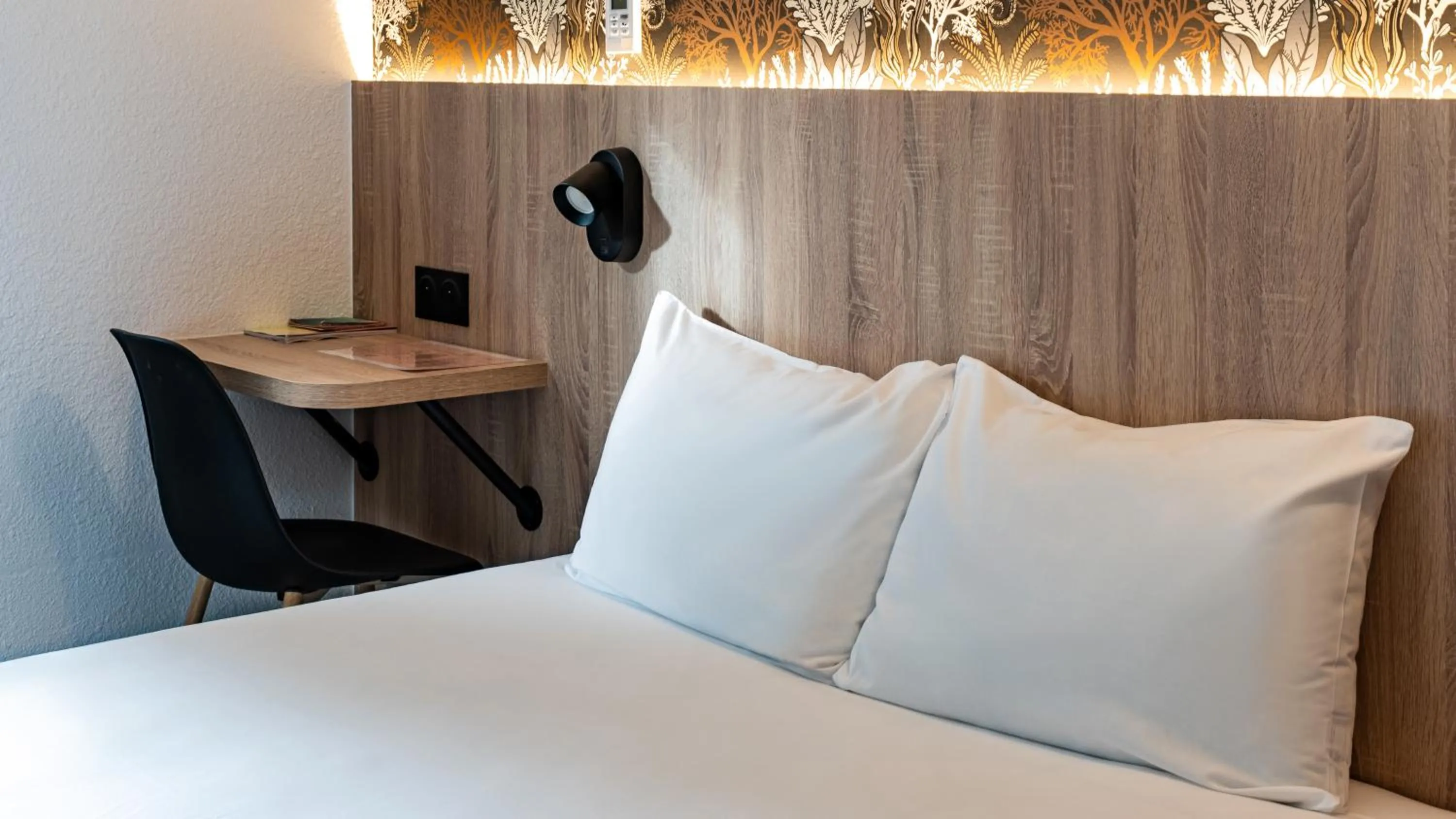 Bed in Quick Palace Anglet