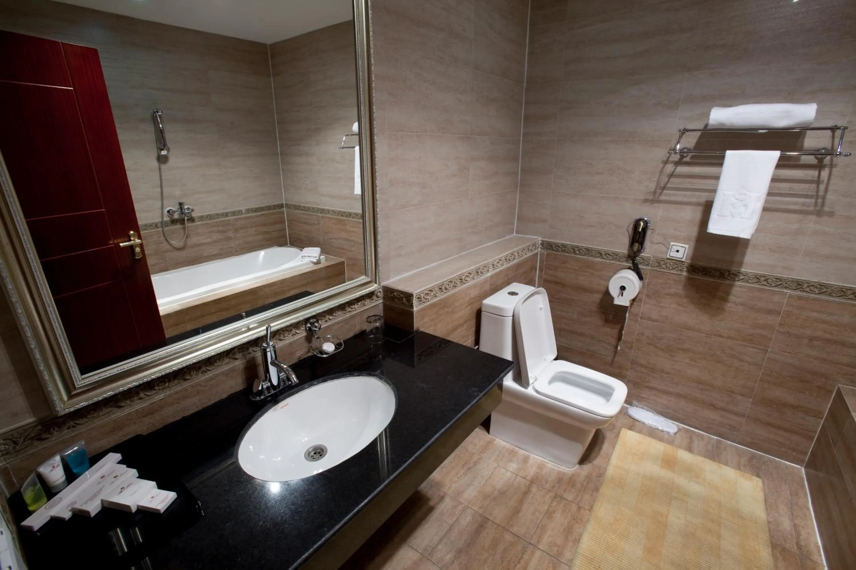 Bathroom in Renion Residence Hotel