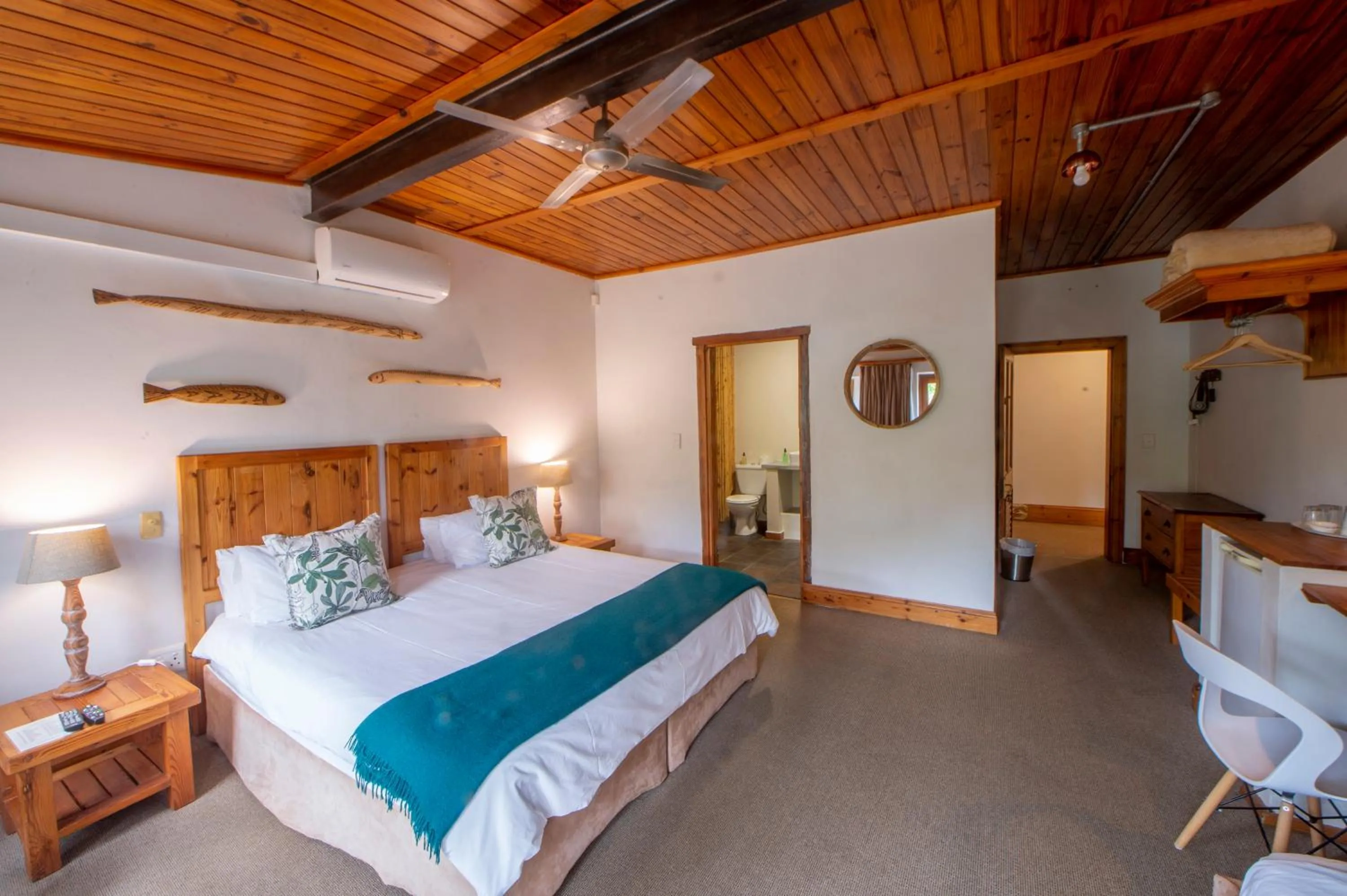 Bed in At the Woods Guest House