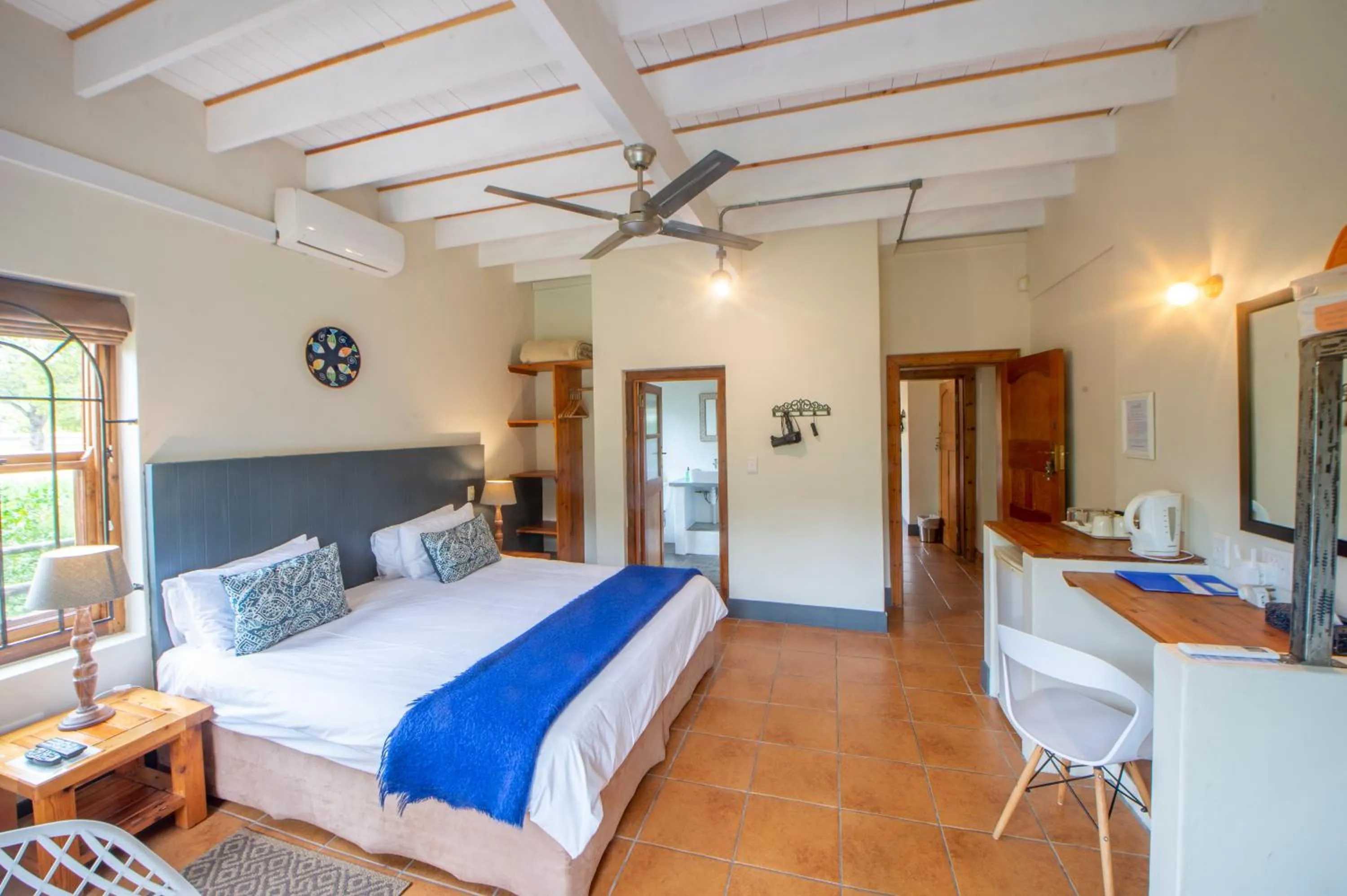 Bed in At the Woods Guest House