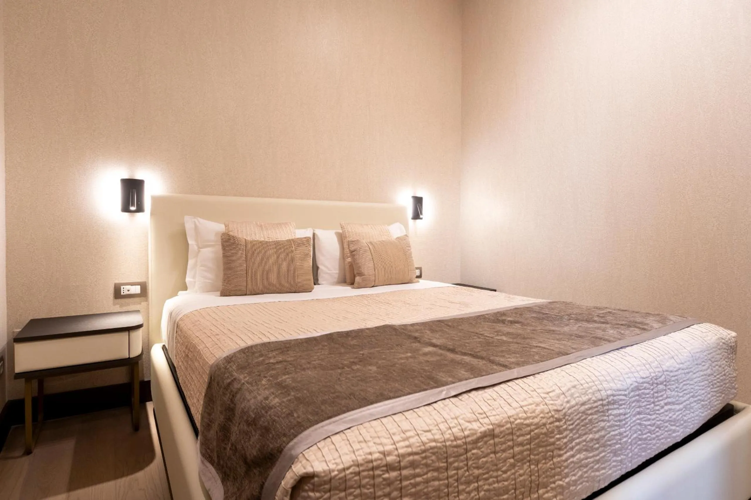 Bed in San Carlo Suite