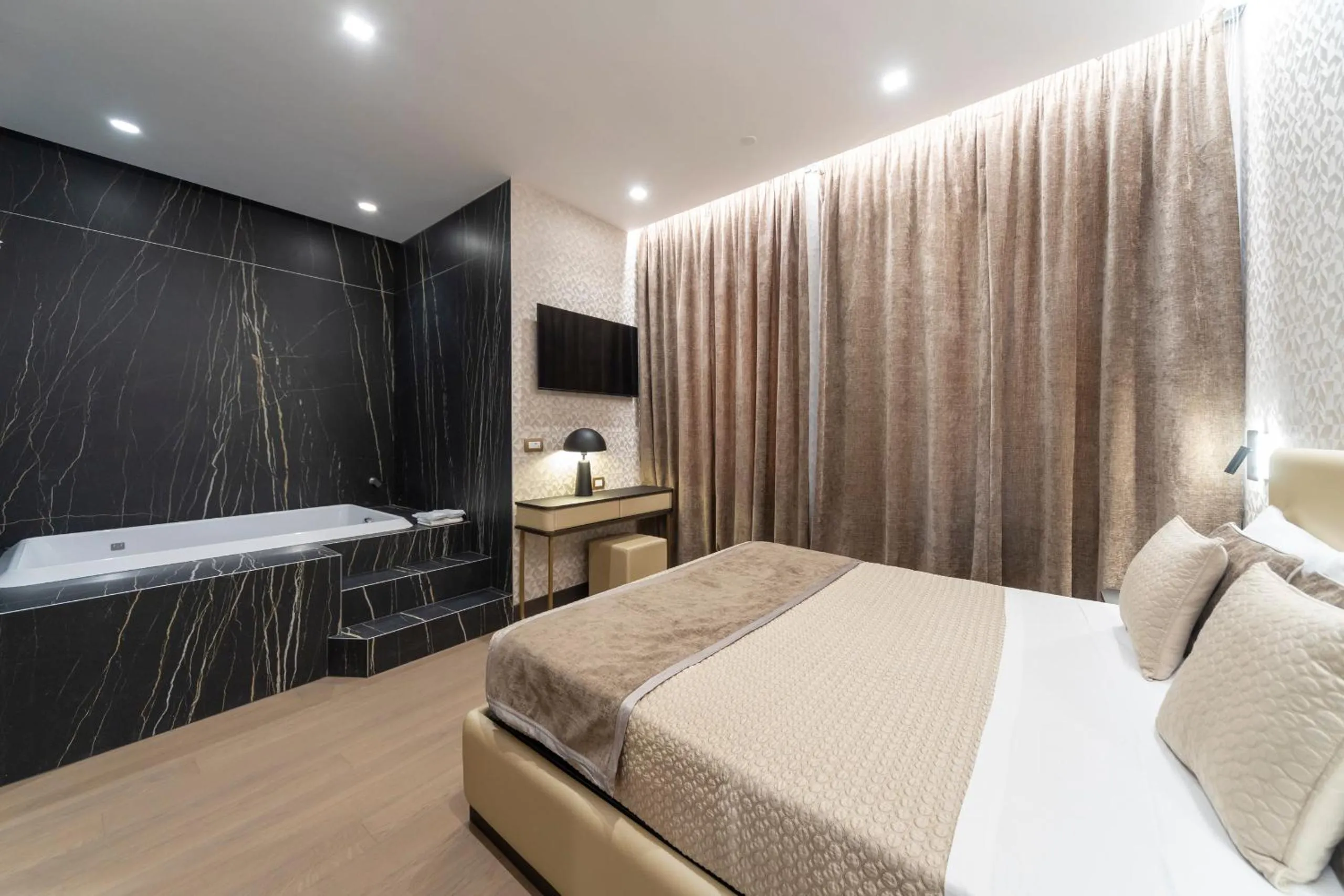 Bed in San Carlo Suite