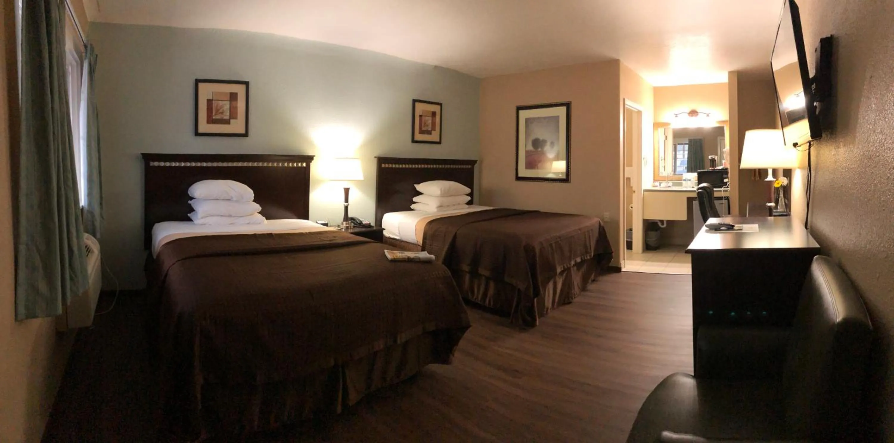 Bed in Value Inn Motel EUGENE AIRPORT