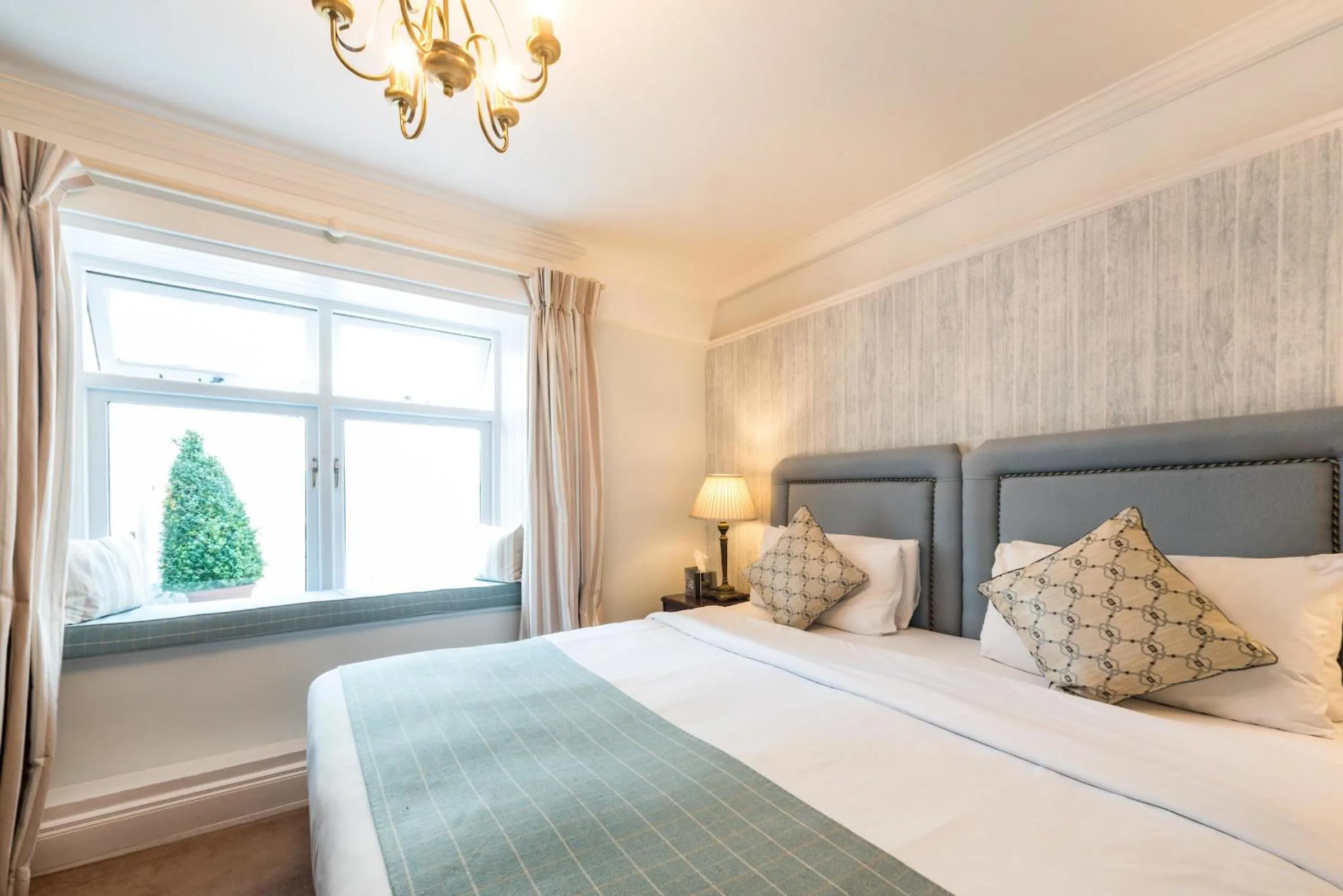 Bedroom, Bed in The Blue Haven Hotel