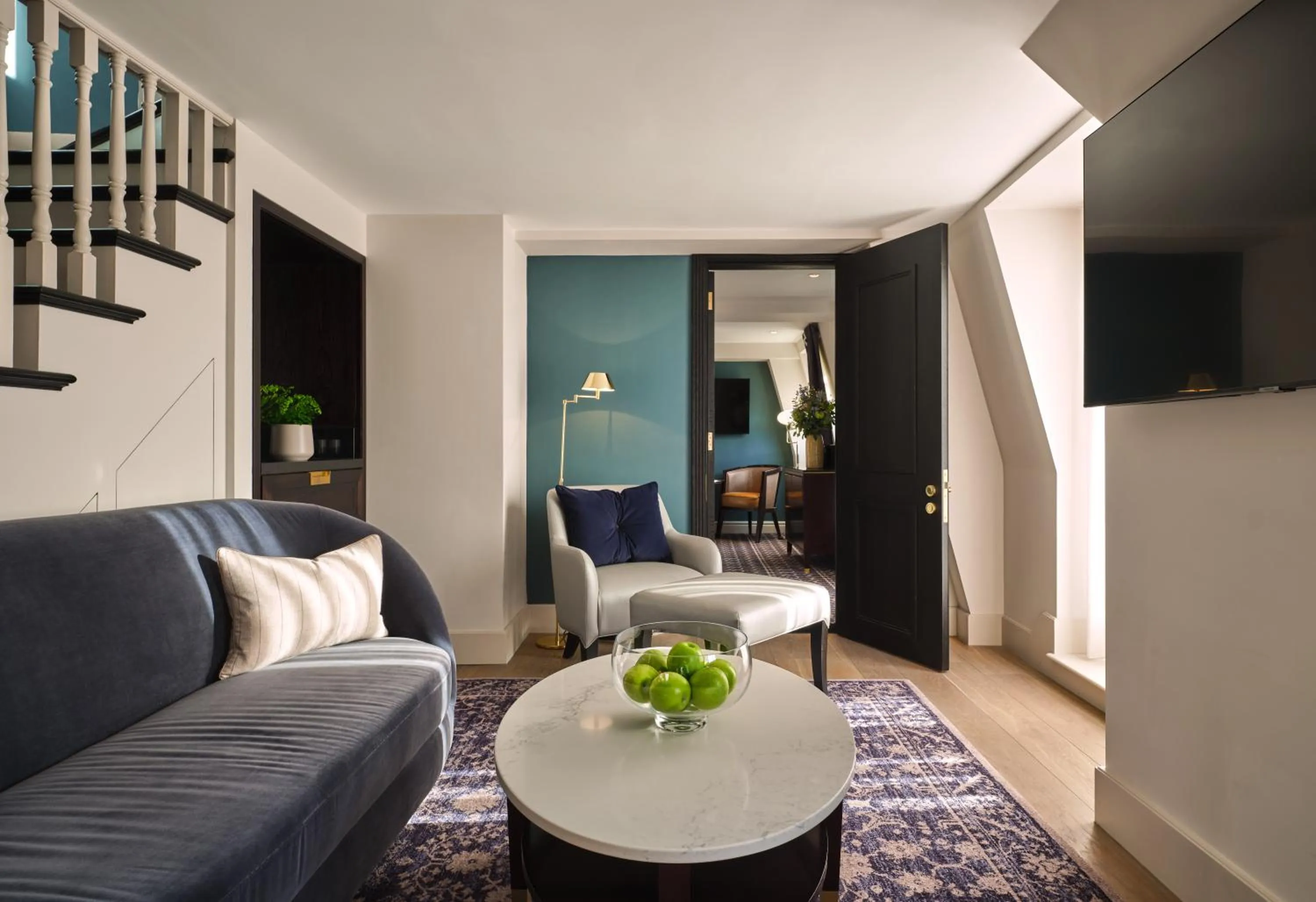 Seating area in The Mayfair Townhouse - an Iconic Luxury Hotel