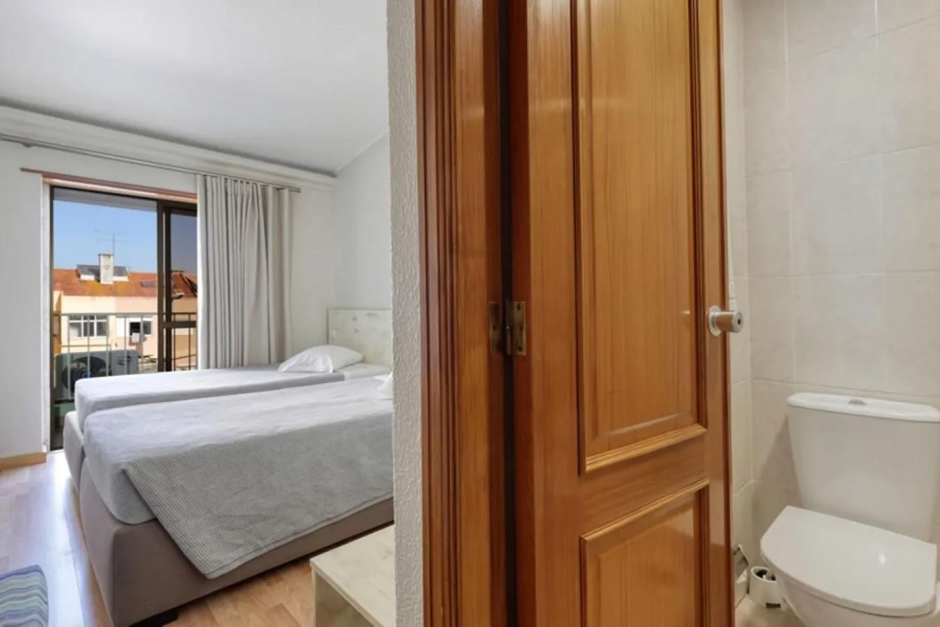 Toilet, Bed in Hotel Nova Cidade