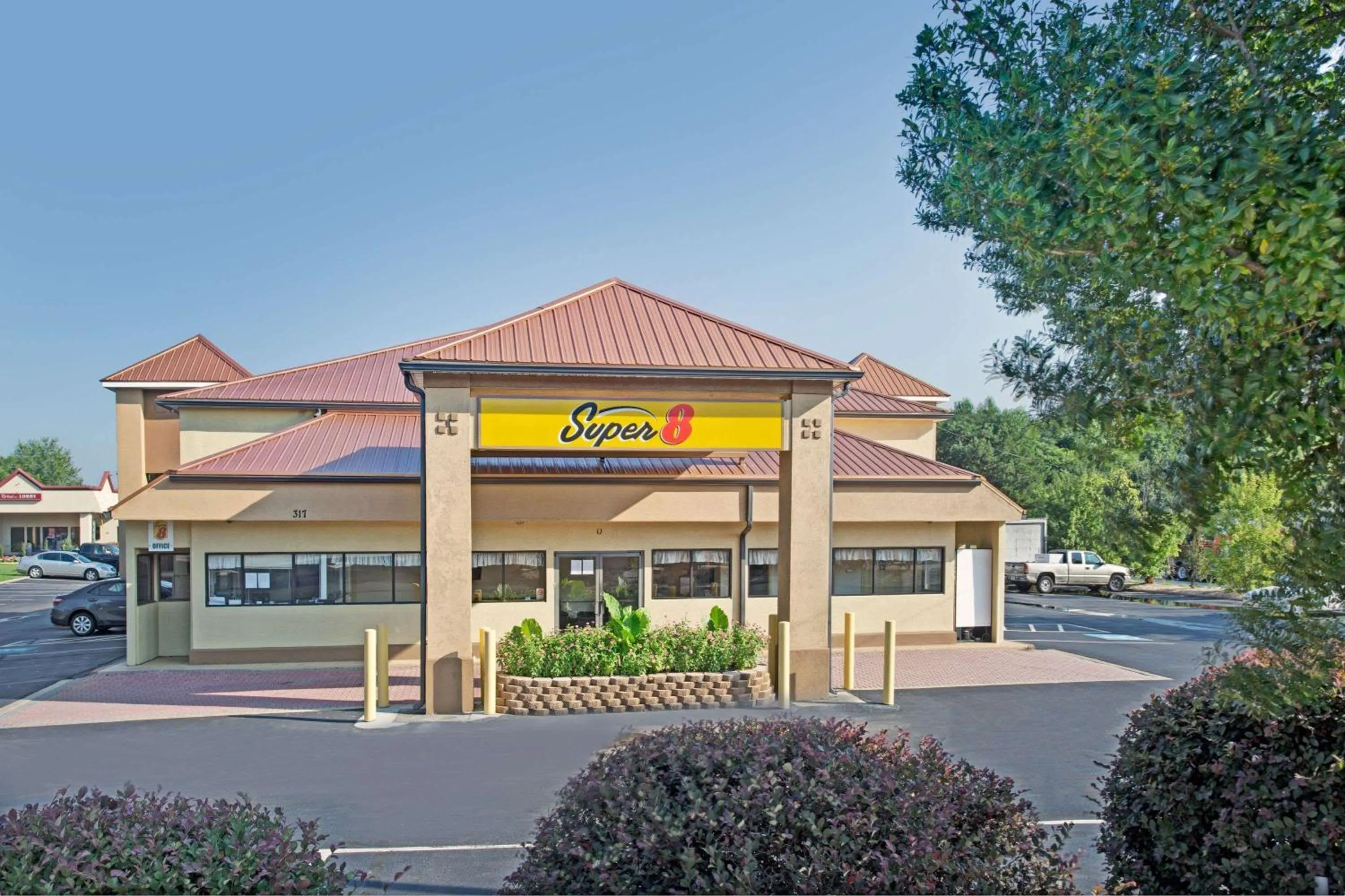 Property building in Super 8 by Wyndham Suwanee