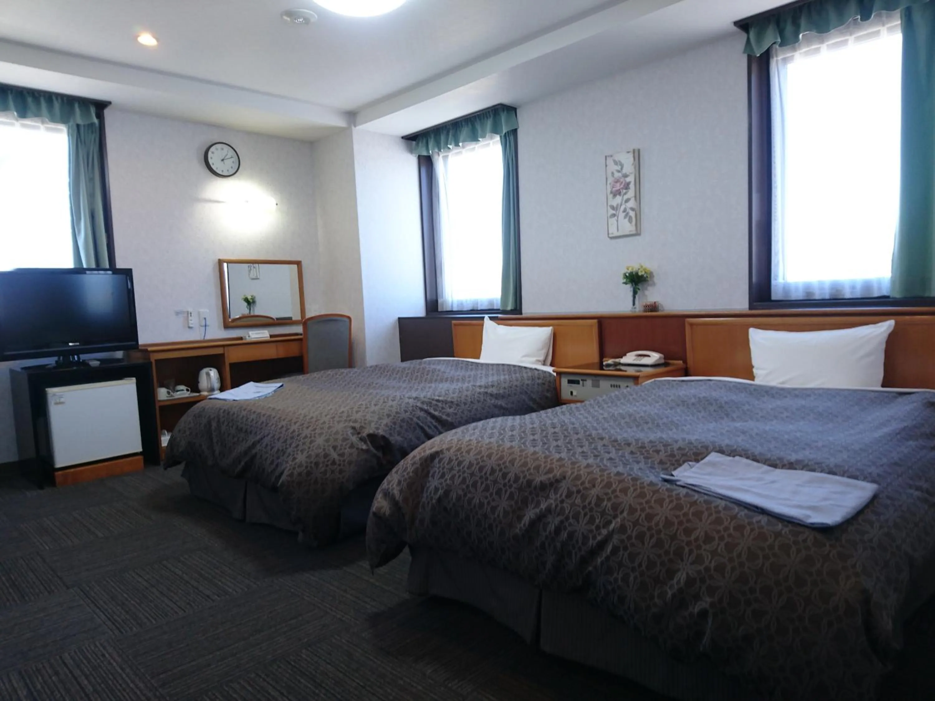 Photo of the whole room, Bed in Terminal Hotel Matsuyama