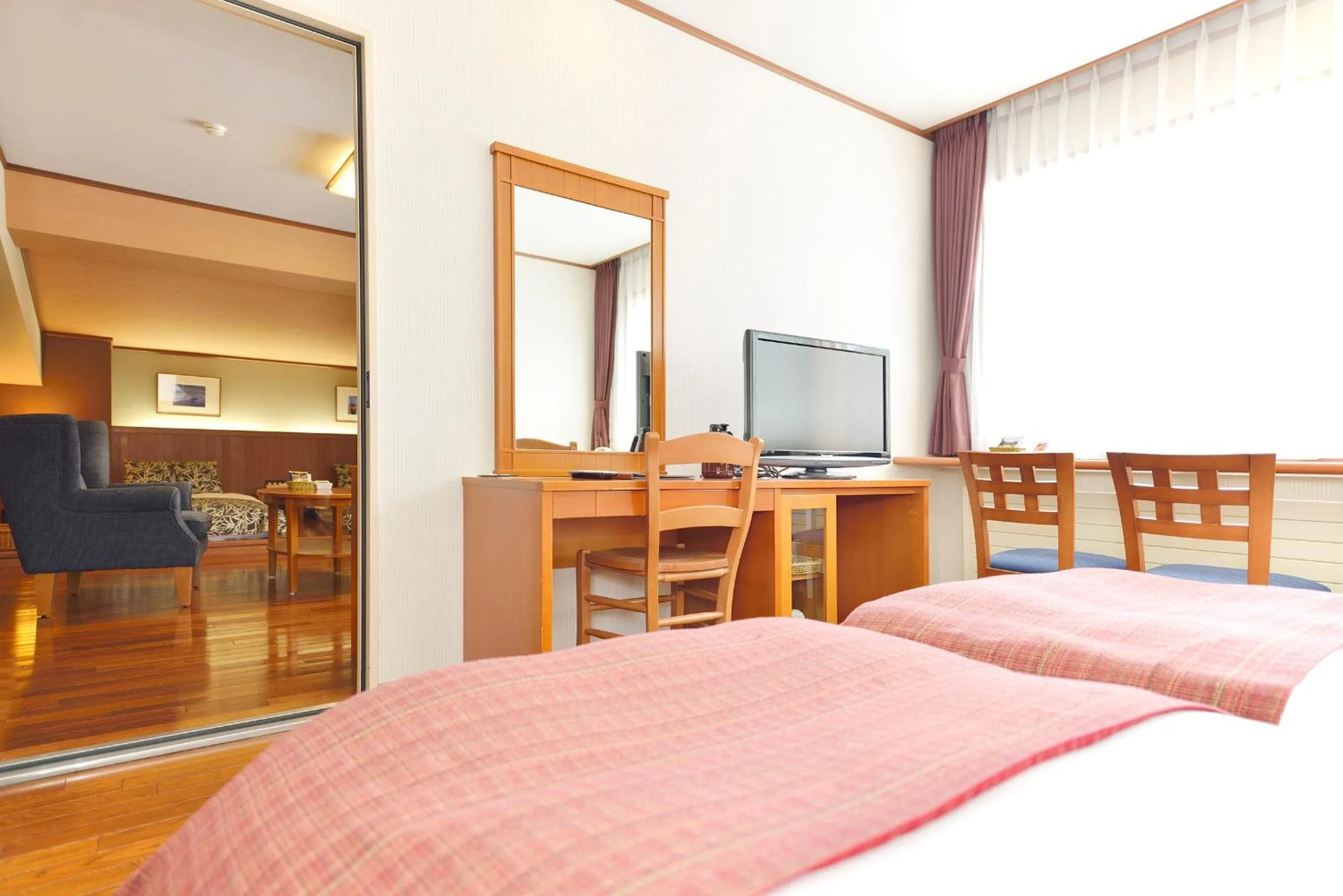 Photo of the whole room, TV/Entertainment Center in Asahidake Onsen Hotel Deer Valley